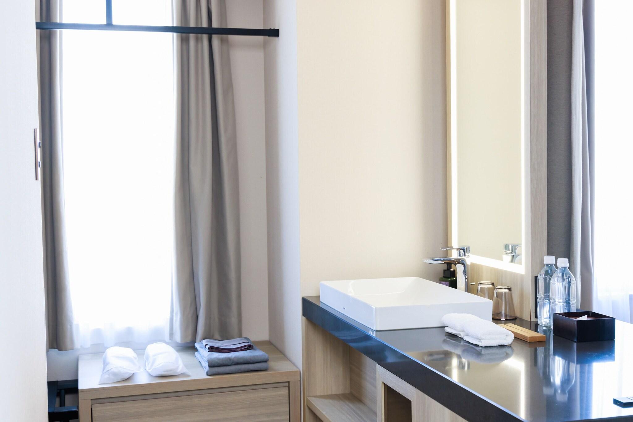 Twin Deluxe Two Beds