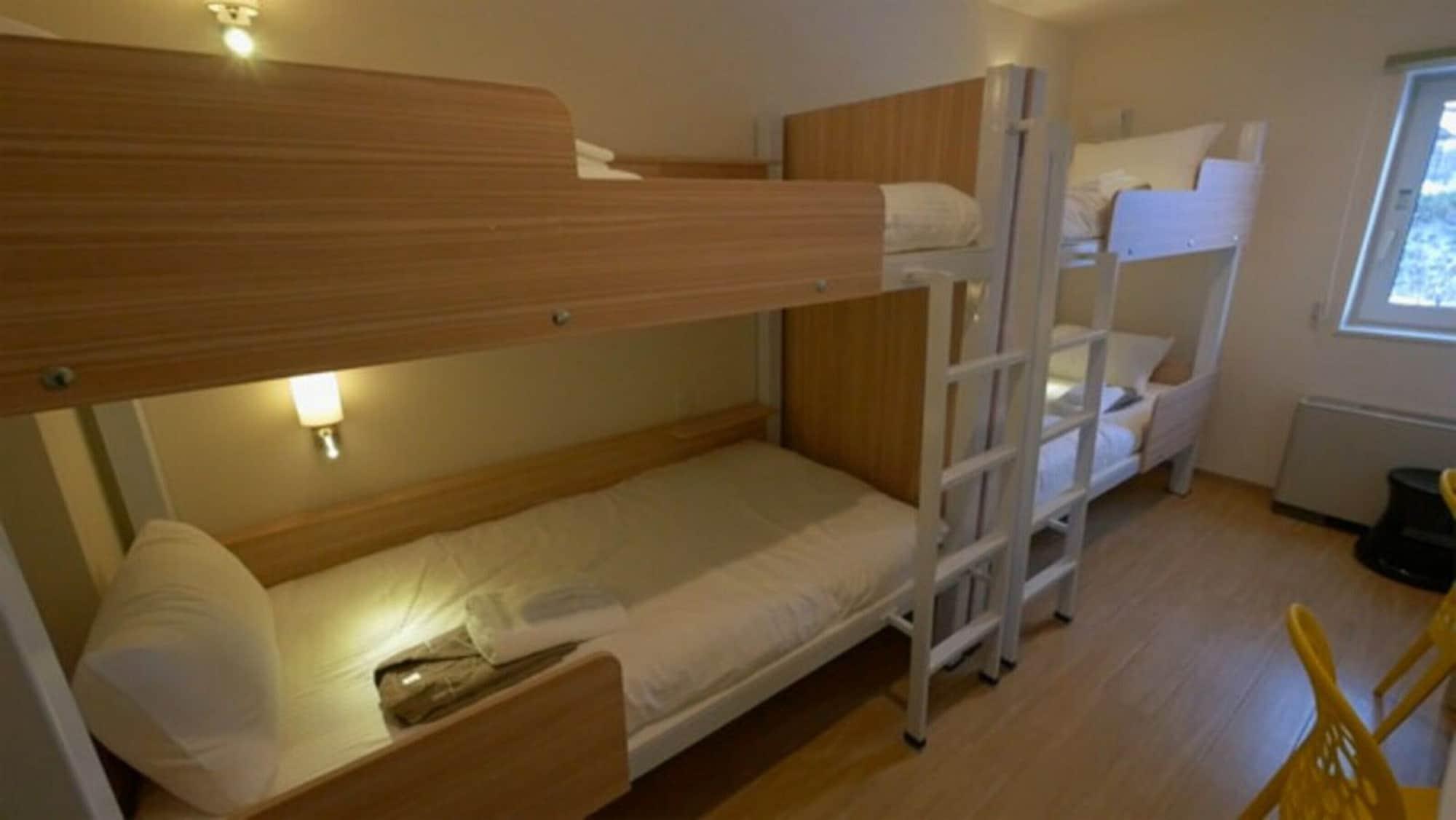 Bed in Dormitory Male Room