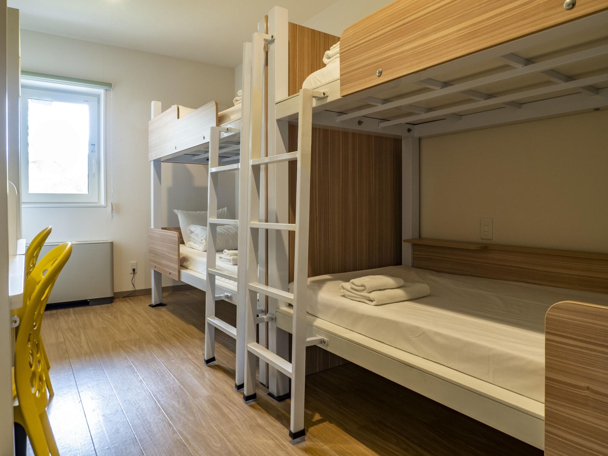Bed in Dormitory Female Room