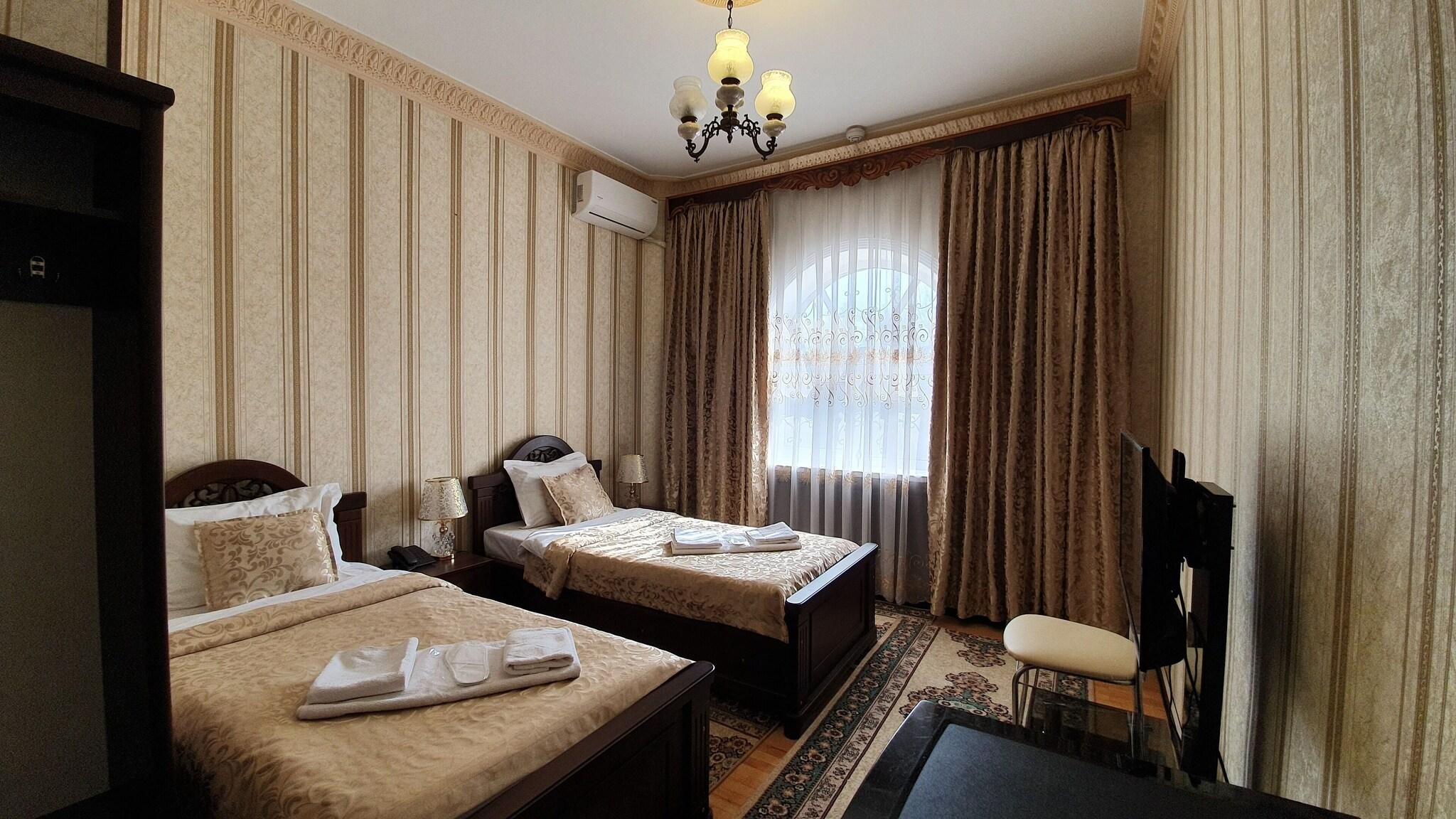 Twin Deluxe Two Beds