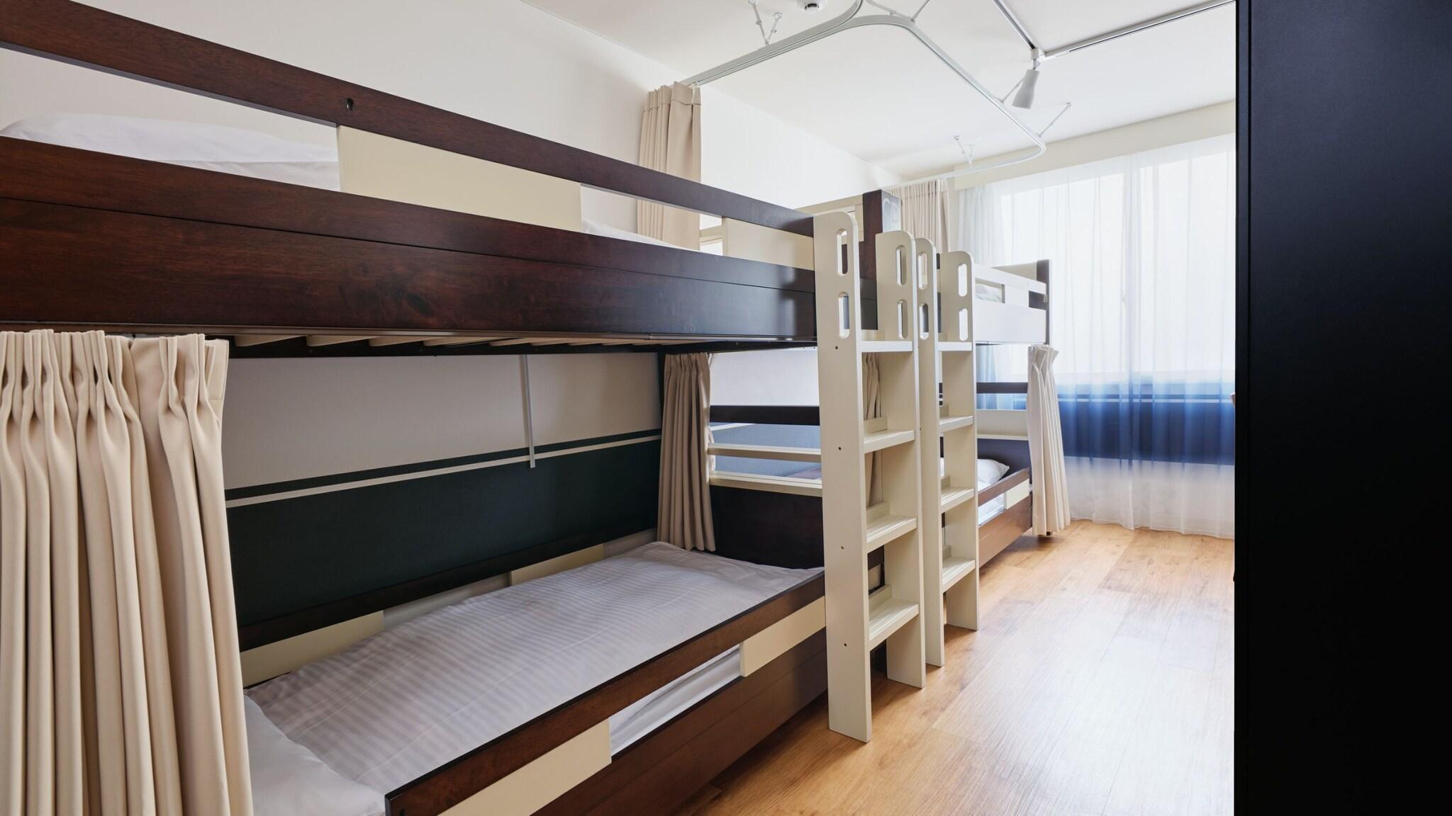 Bed in Dormitory Bunk Bed with Shared Bathroom