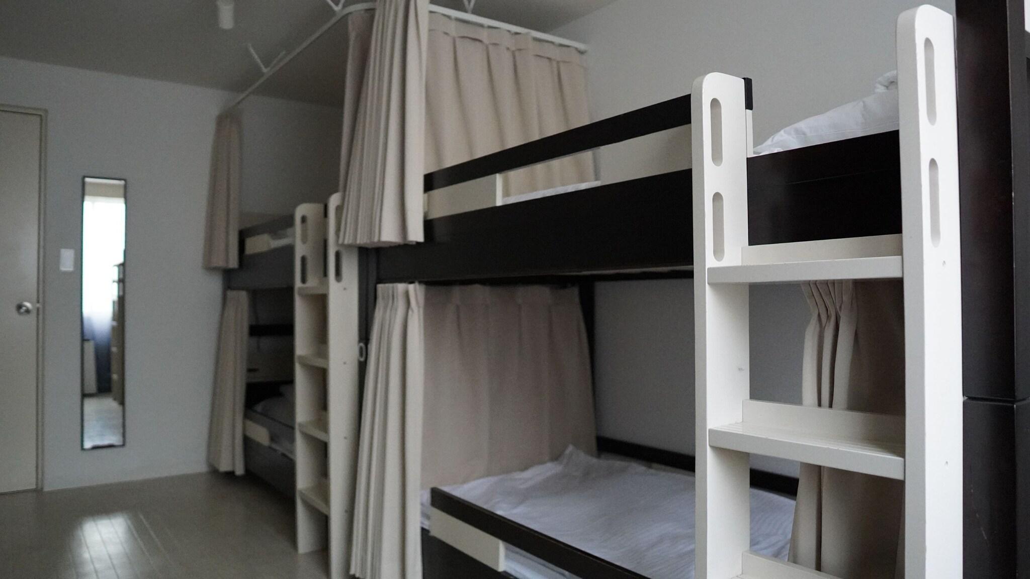 Bed in Dormitory Bunk Bed with Shared Bathroom