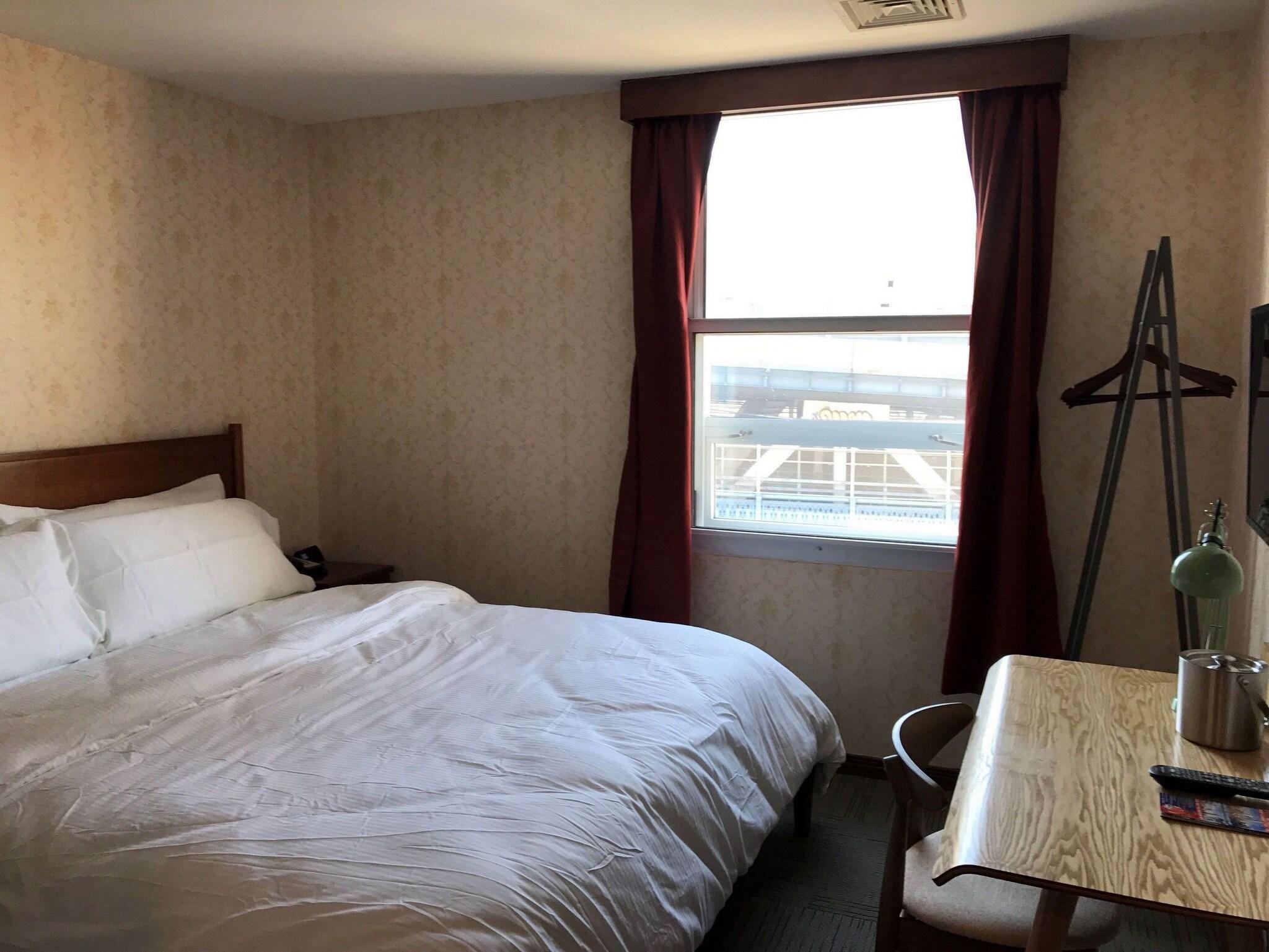 Double Deluxe City View King Bed