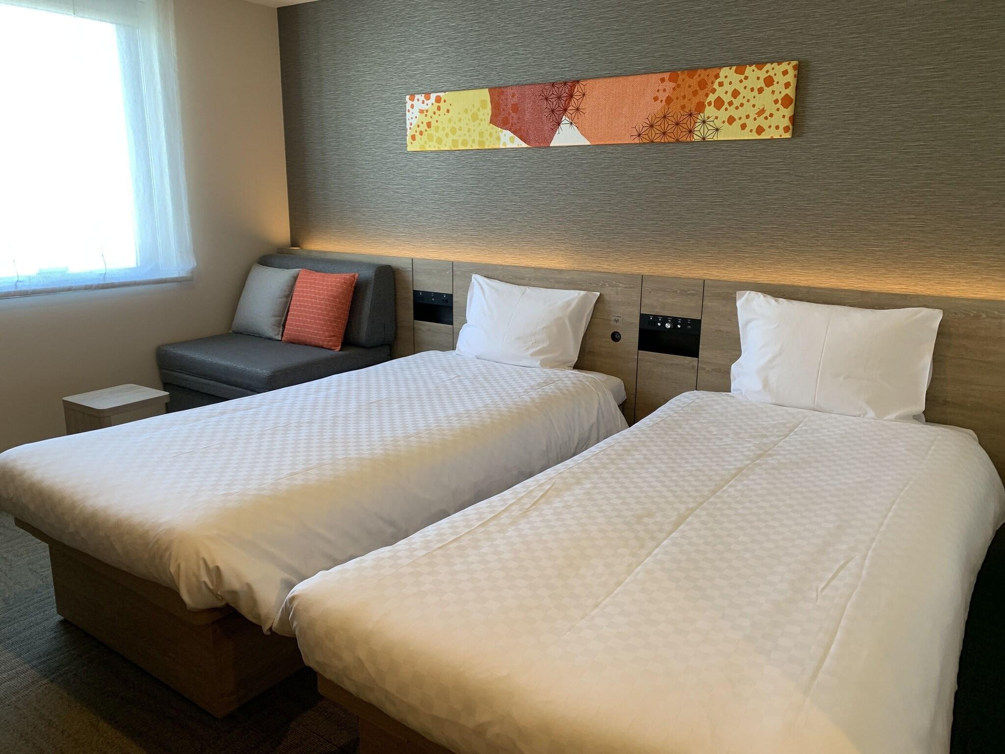 Twin Deluxe Two Beds