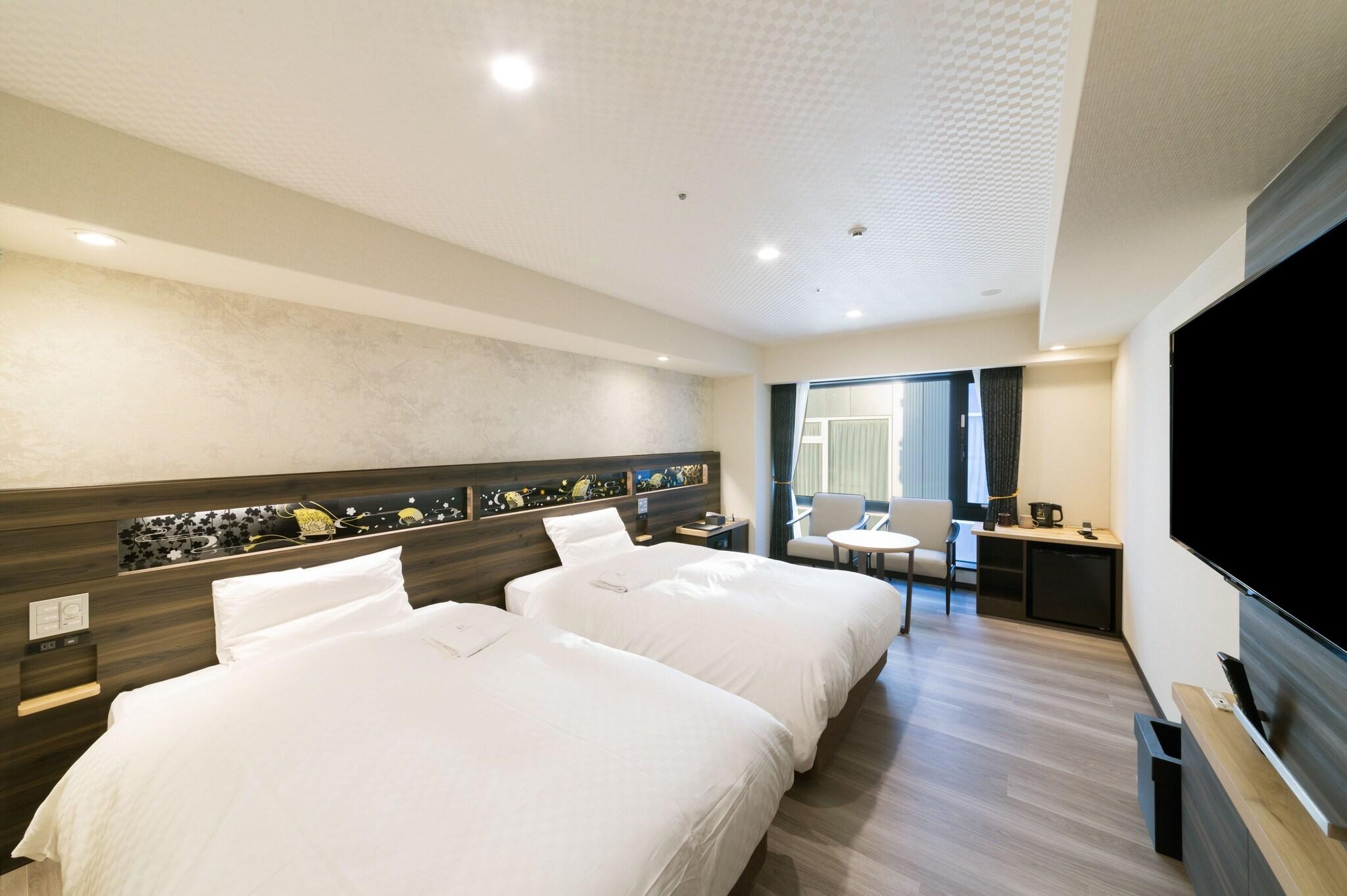 Twin Deluxe Two Beds