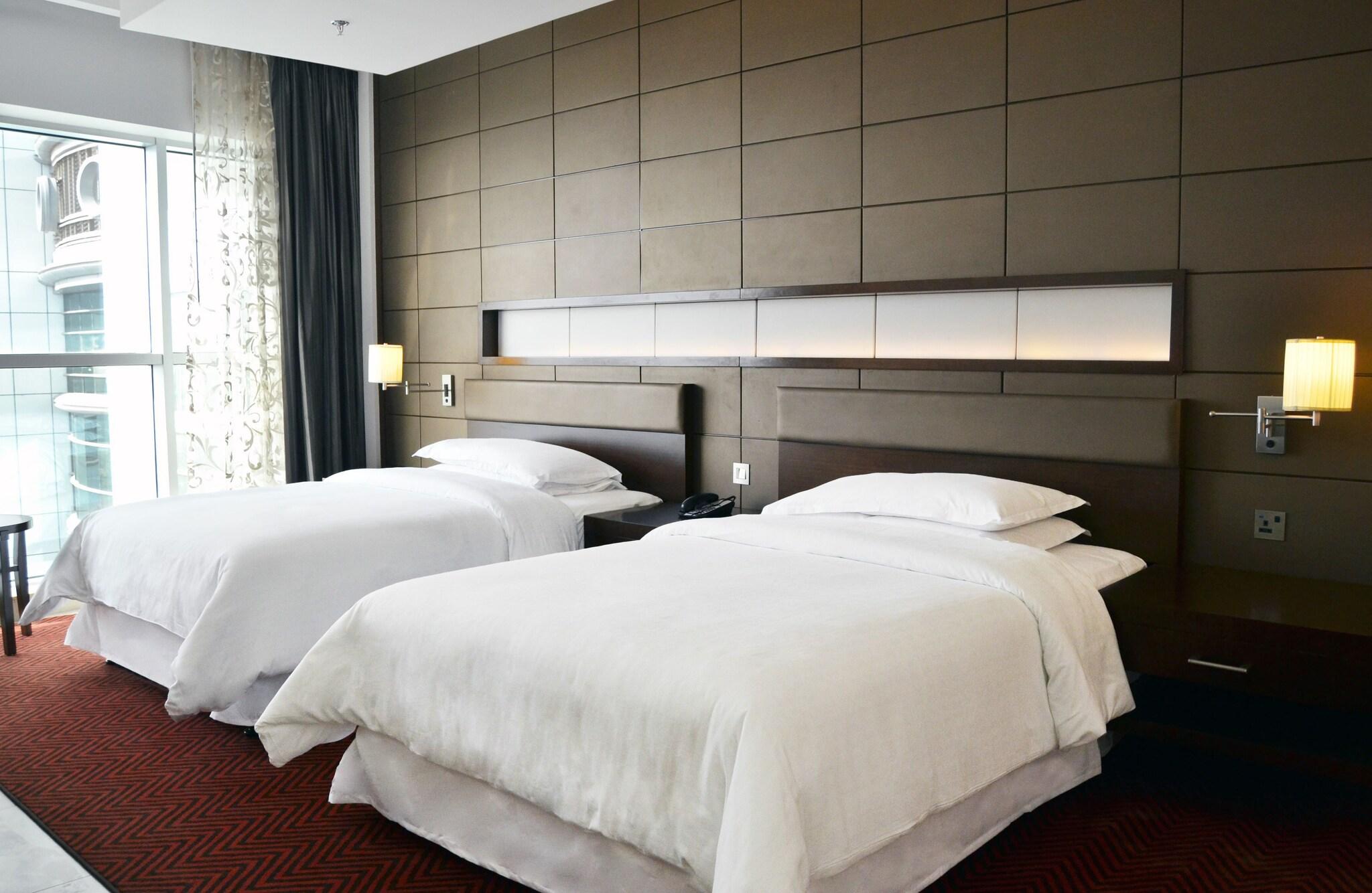 Quadruple Classic Two Queen Beds