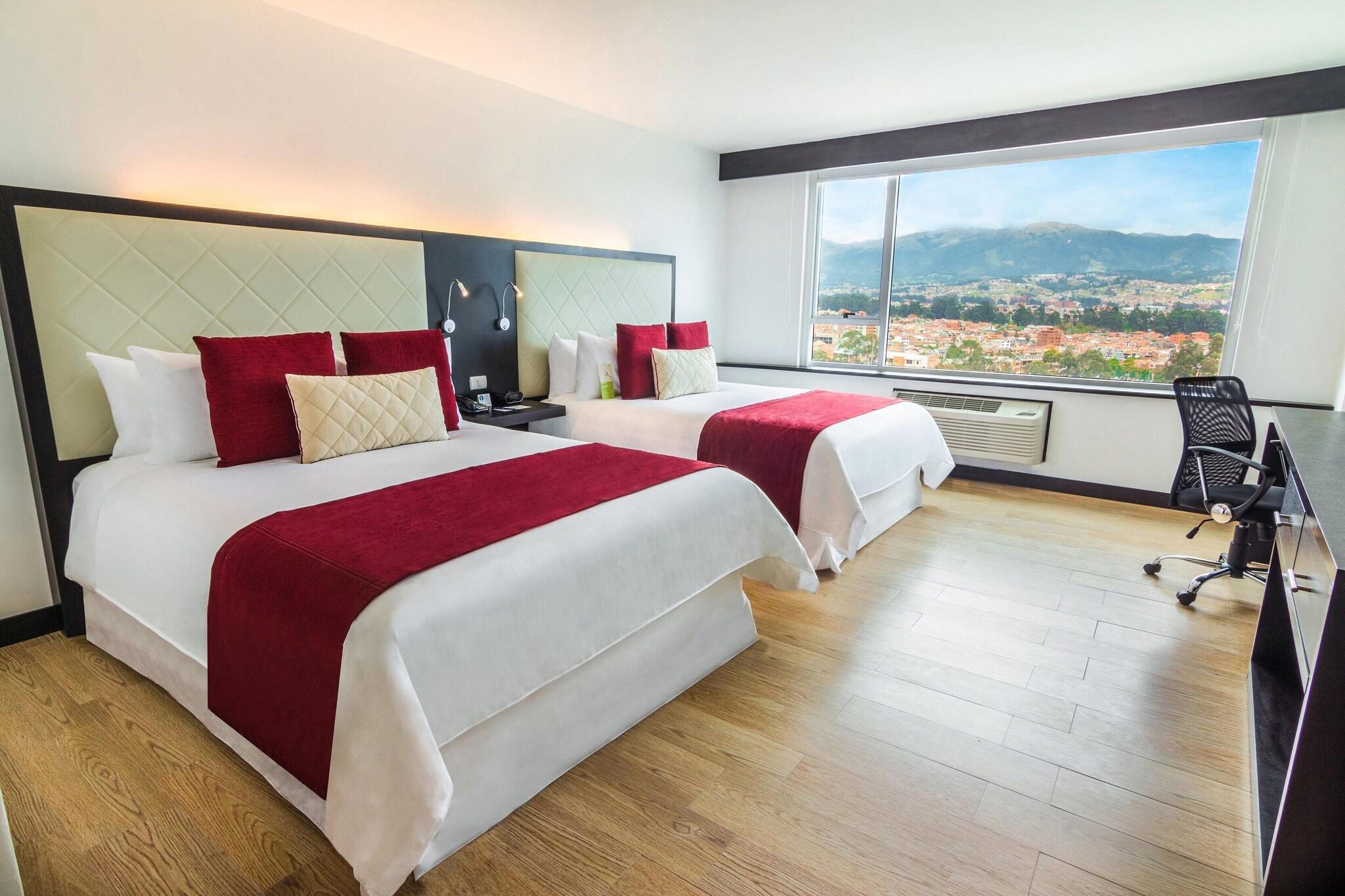 Quadruple Classic Two Queen Beds