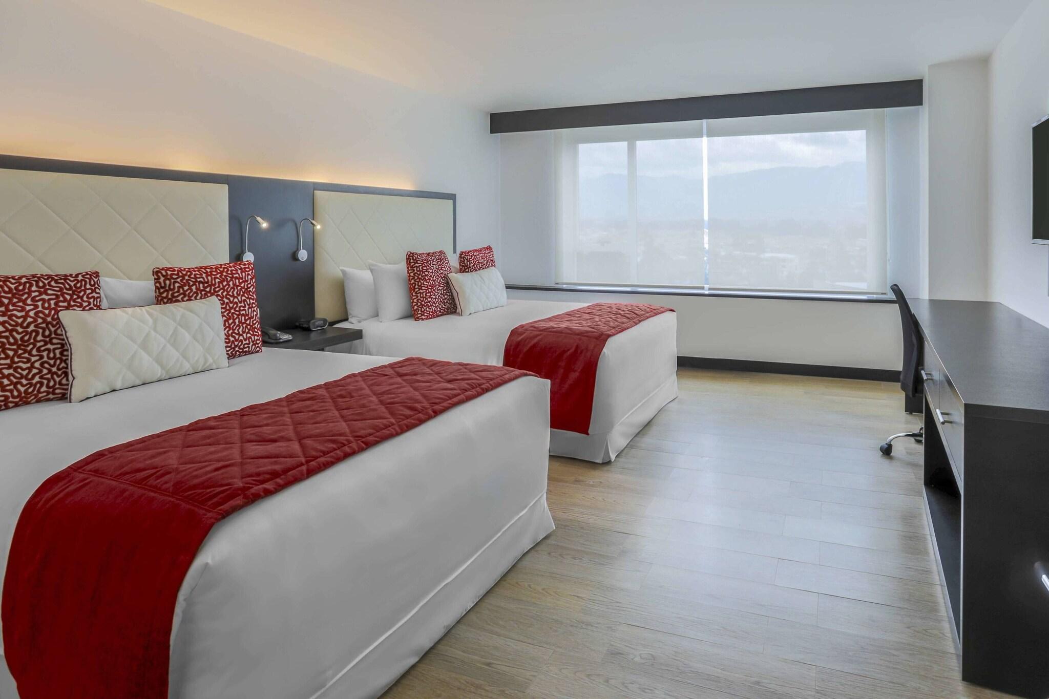 Quadruple Classic Two Queen Beds