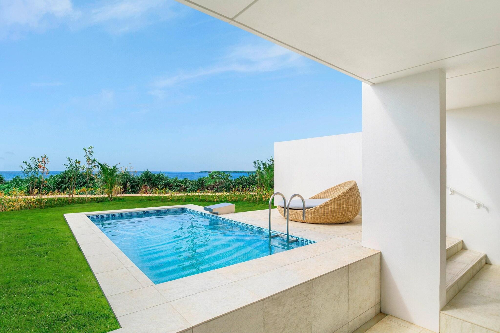 Junior Suite Partial Ocean View Two Double Beds