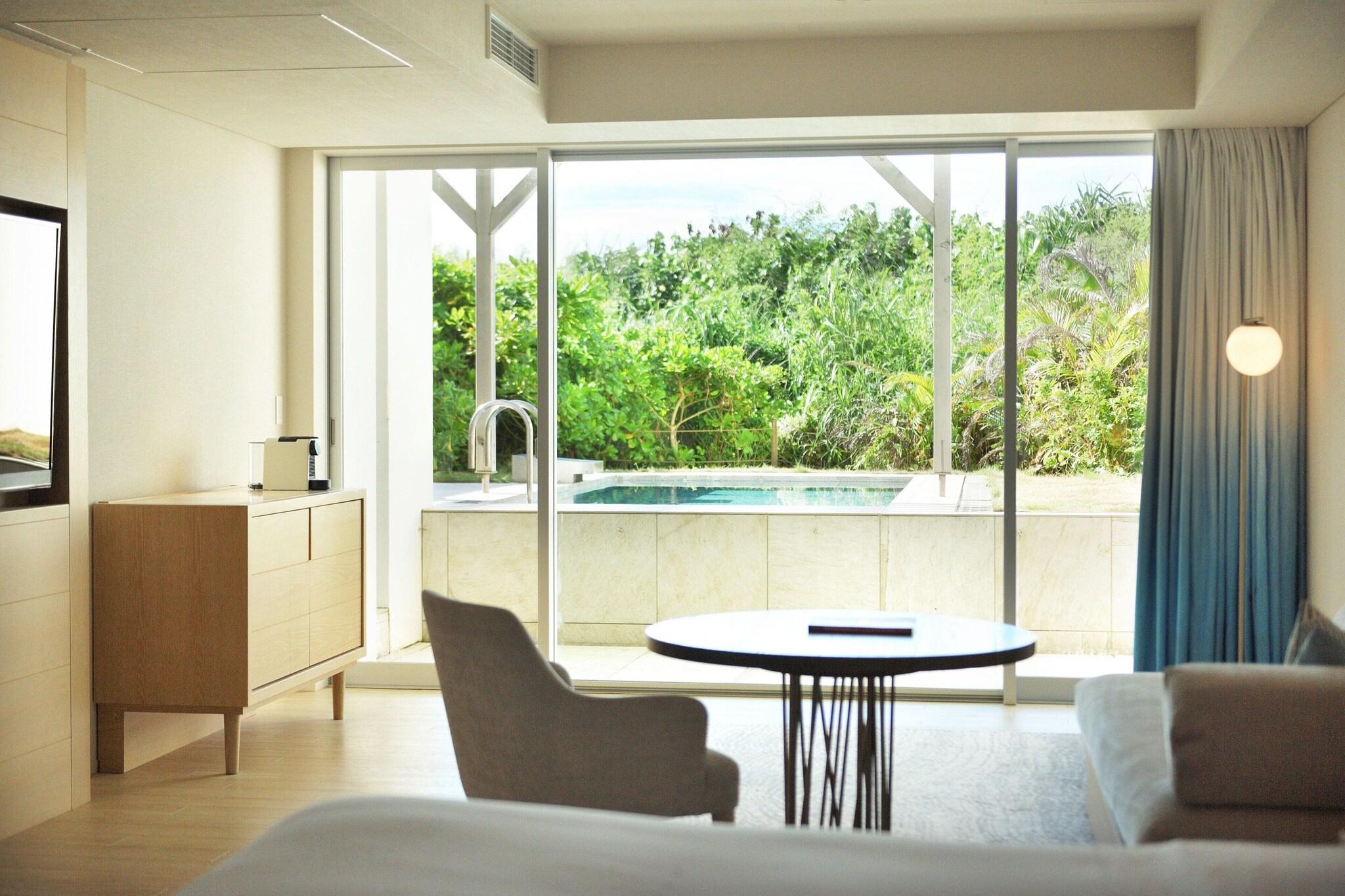 Junior Suite Partial Ocean View Two Double Beds