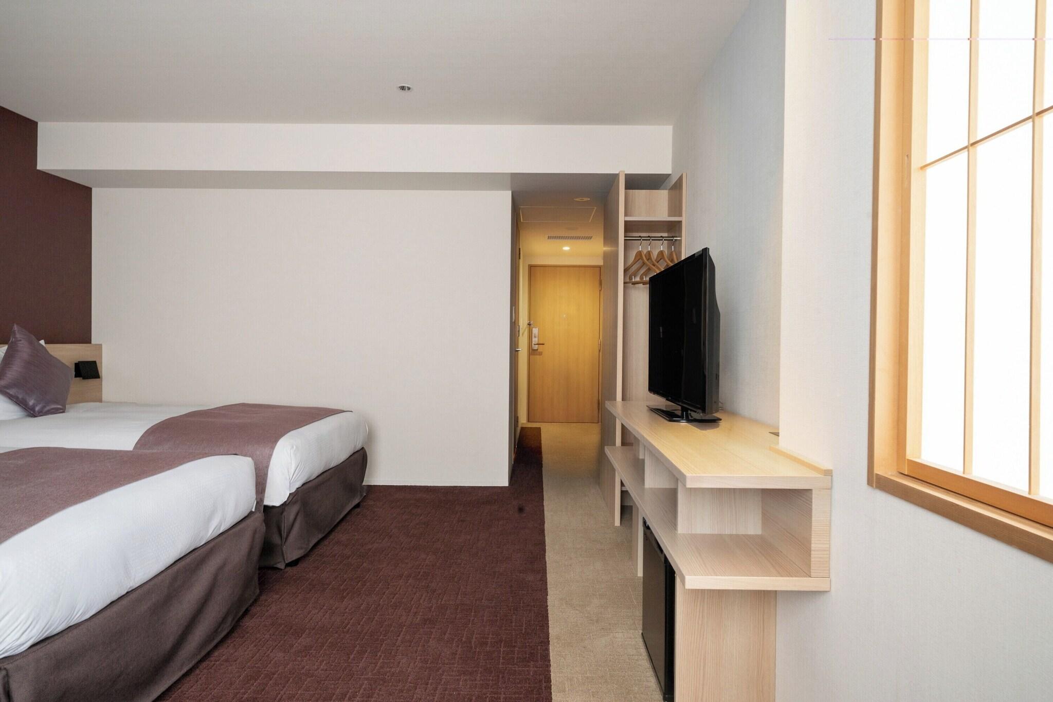 Twin Deluxe Two Beds