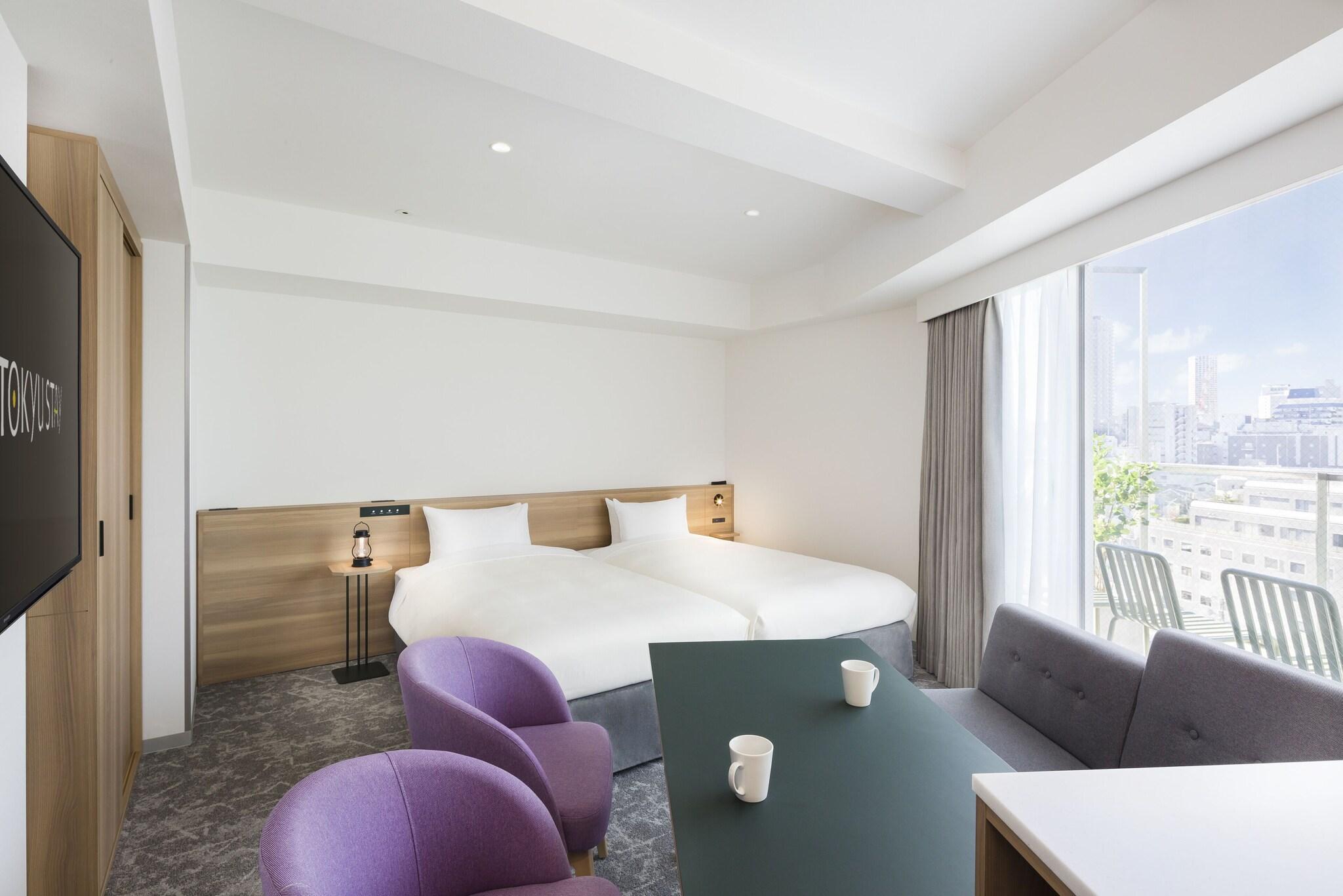 Twin Deluxe Two Beds