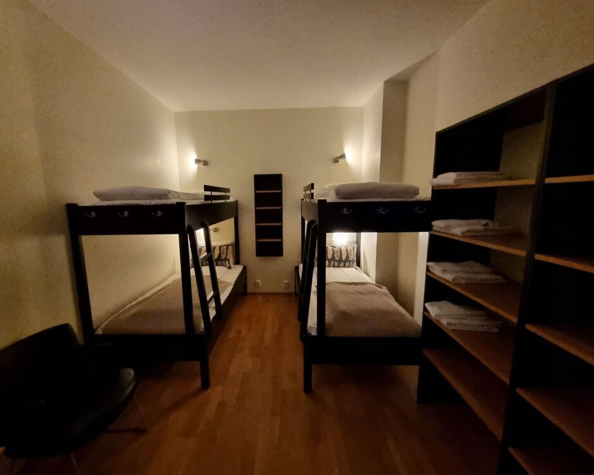 Quadruple Bunk Bed with Shared Bathroom