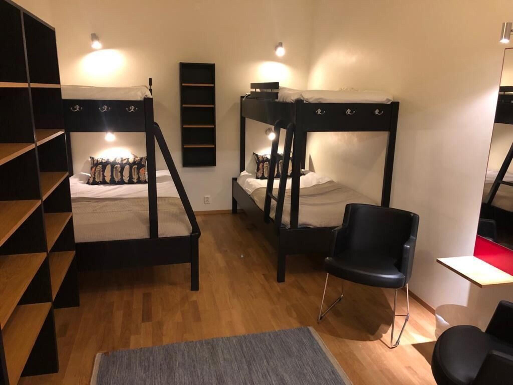 Quadruple Bunk Bed with Shared Bathroom