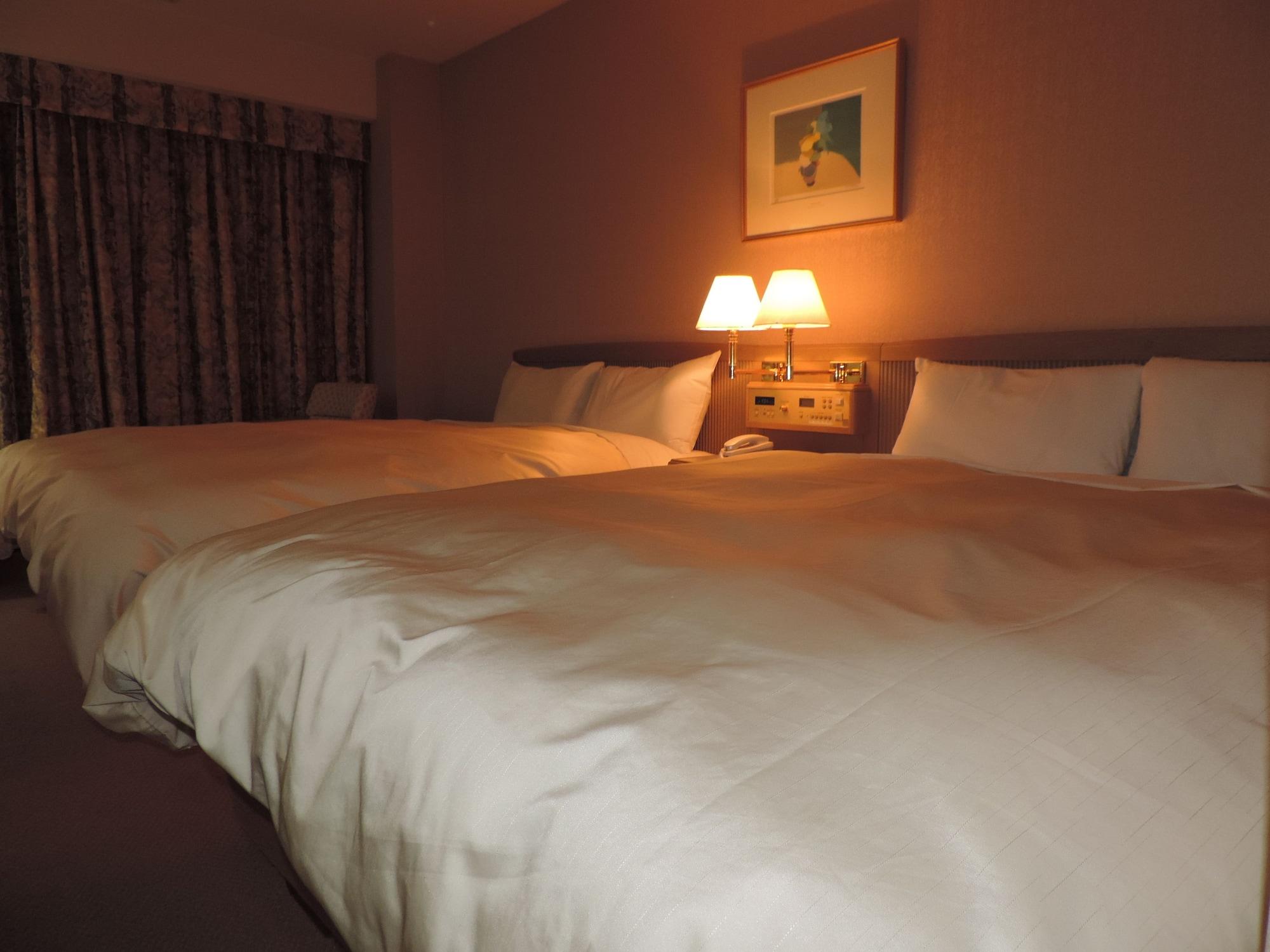 Twin Deluxe Two Beds