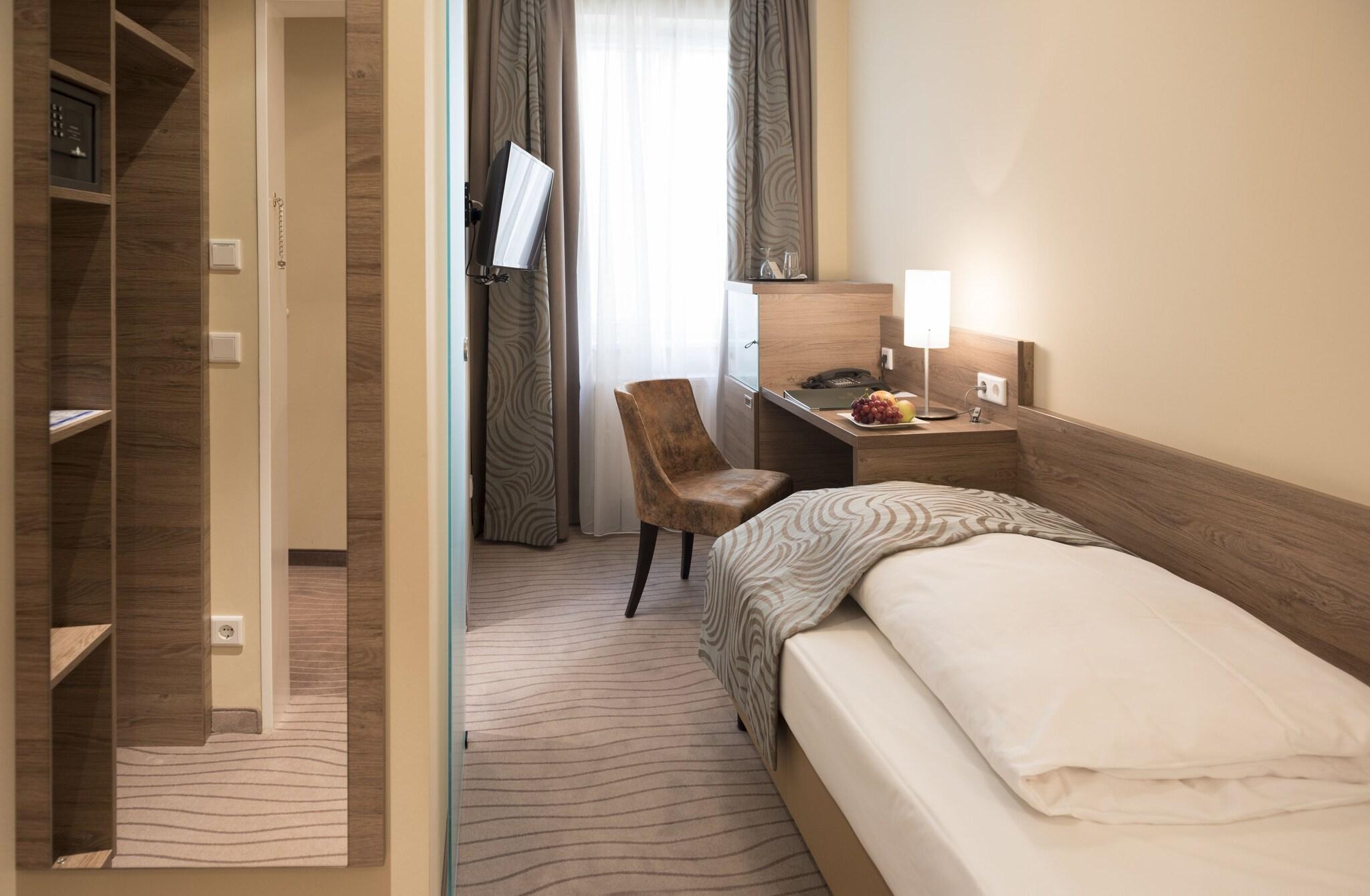 Single Economy with Shared Bathroom