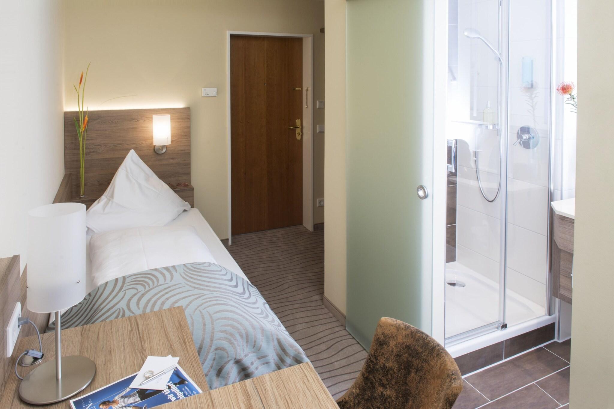 Single Economy with Shared Bathroom