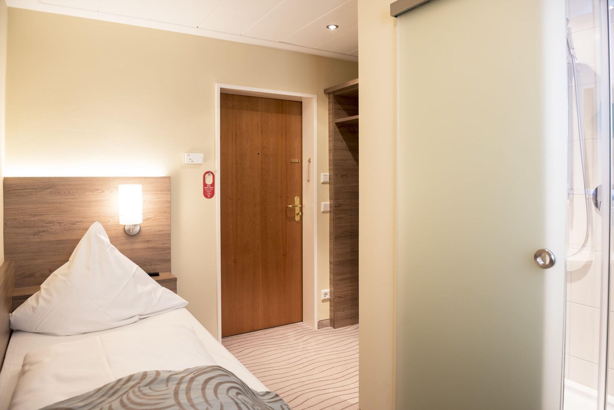 Single Economy with Shared Bathroom