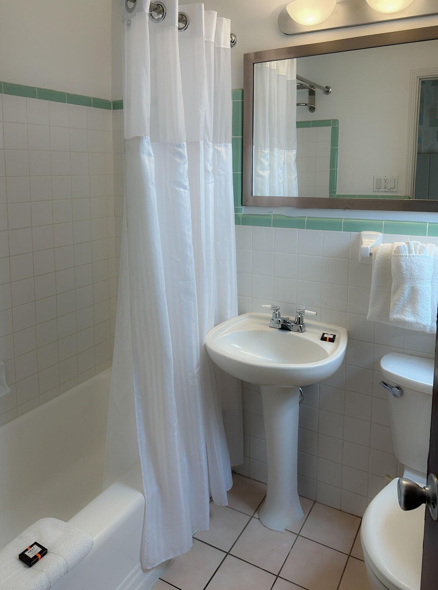 Quadruple Partial Ocean View Two Double Beds