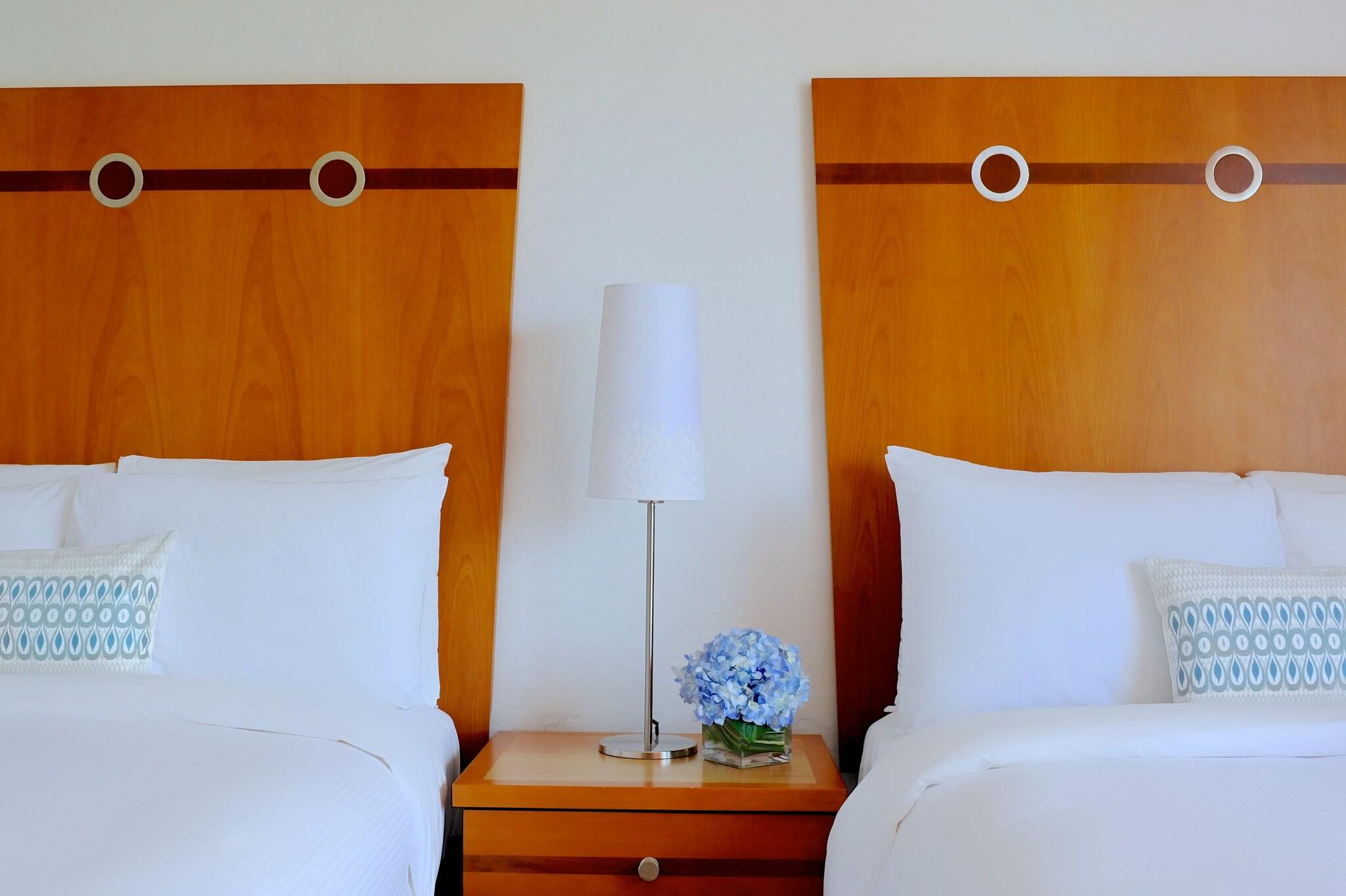 Quadruple Partial Ocean View Two Double Beds