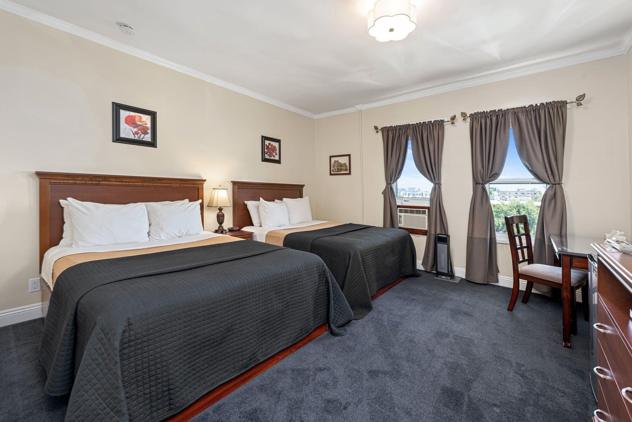 Double Deluxe Two Queen Beds