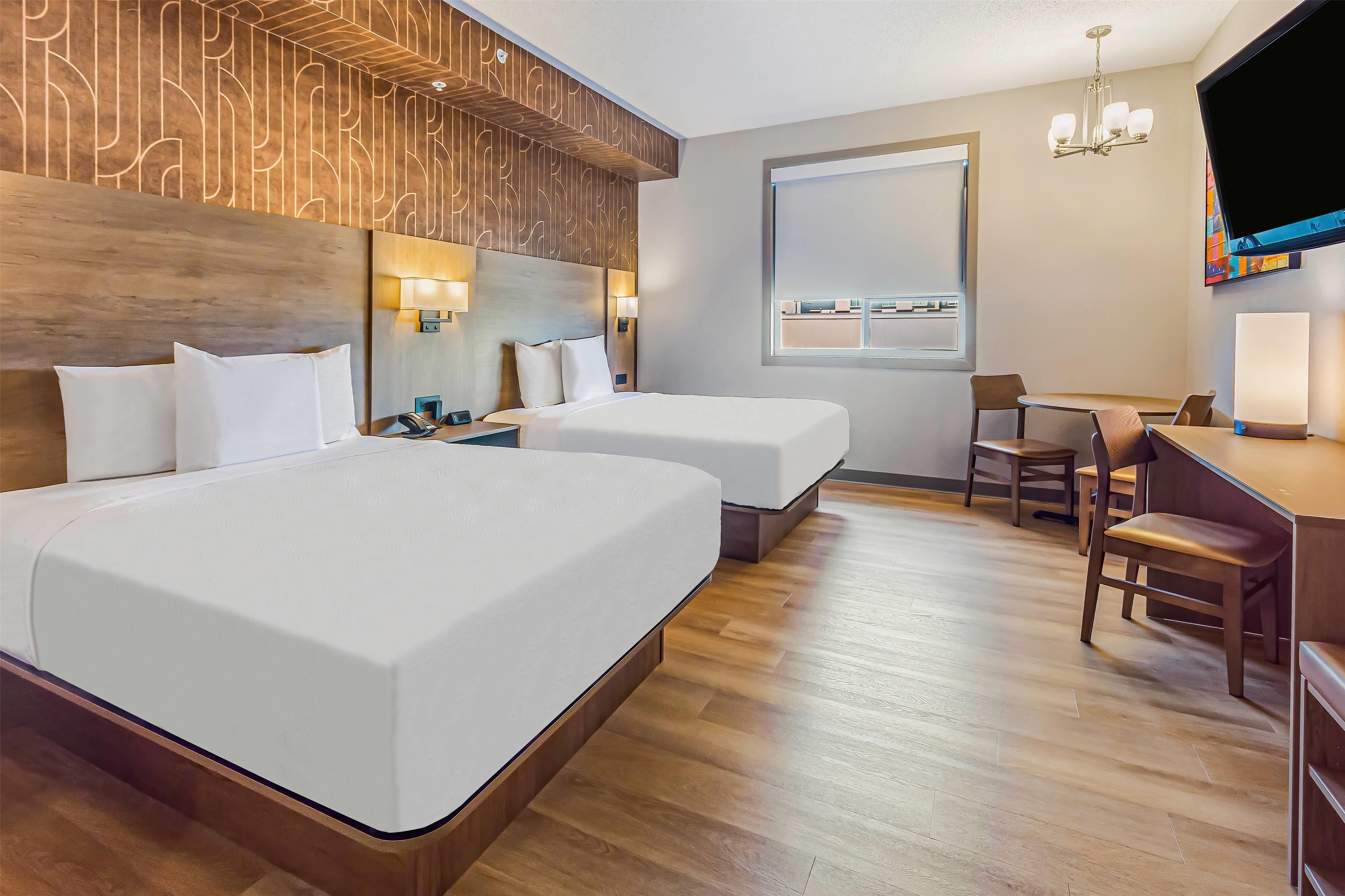 Quadruple Two Queen Beds