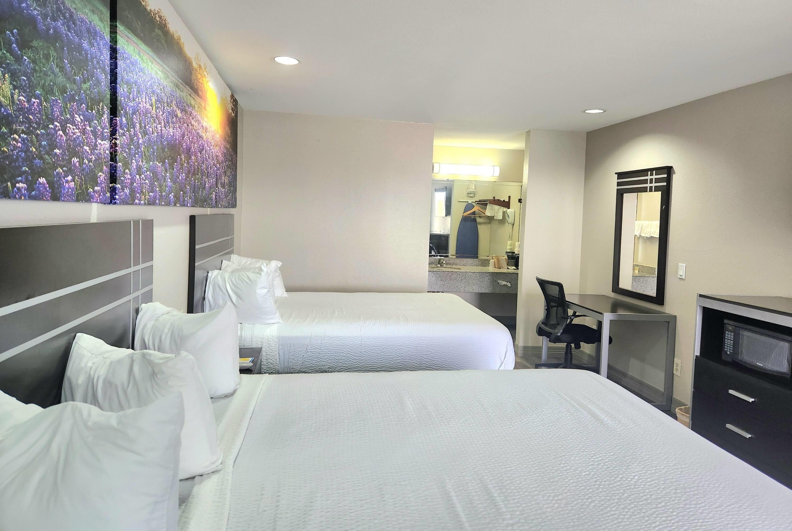 Quadruple Two Queen Beds