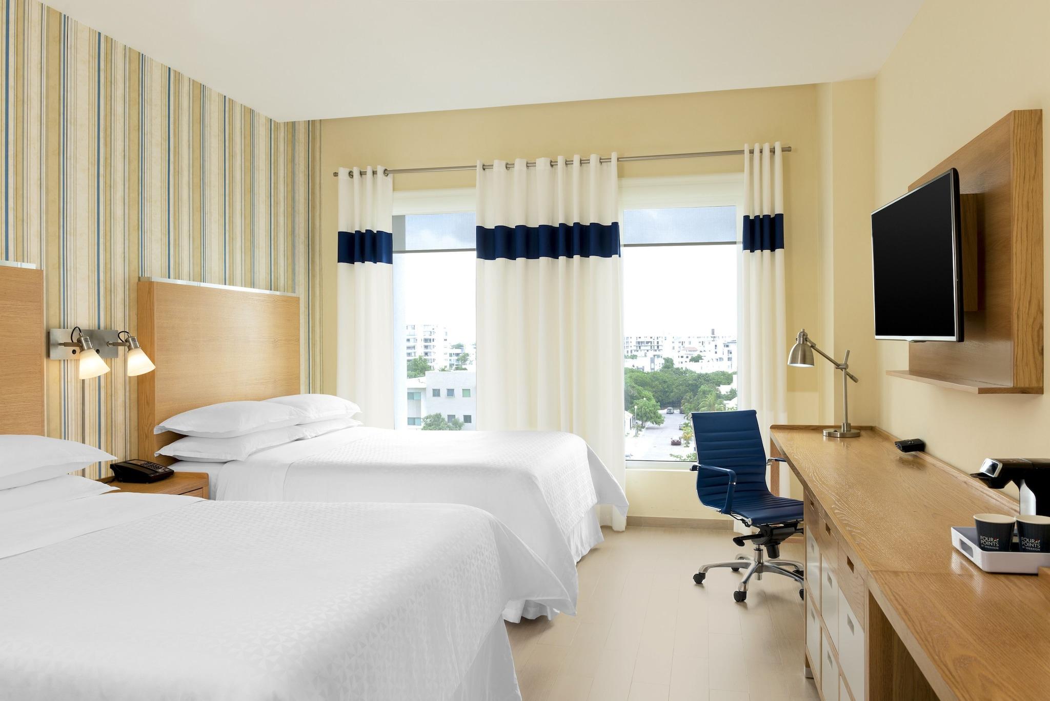 Quadruple City View Two Queen Beds