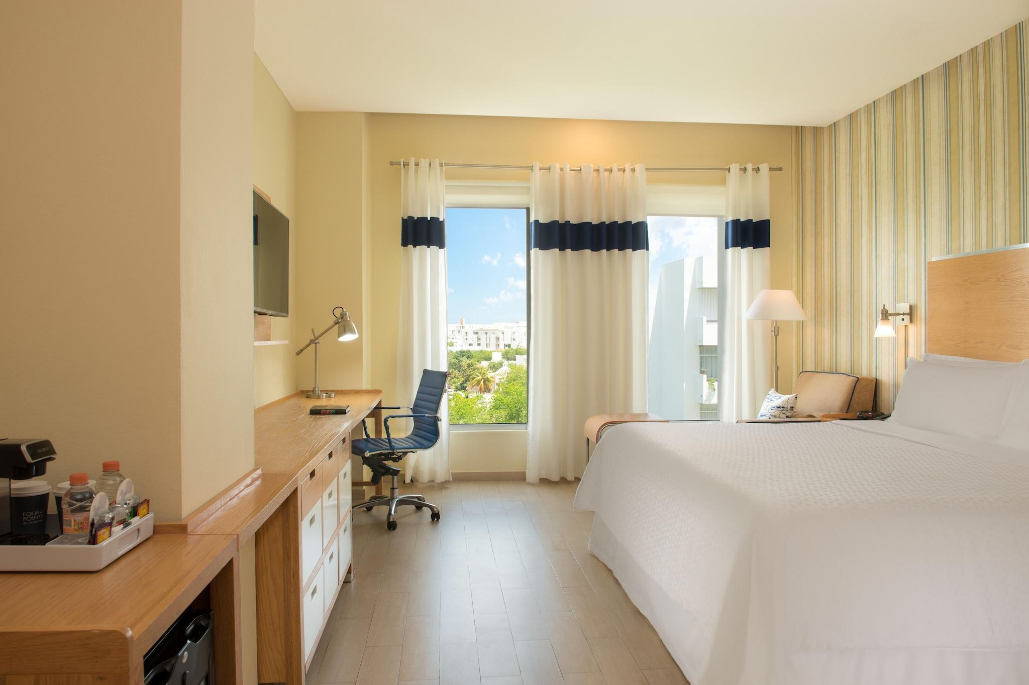 Quadruple City View Two Queen Beds