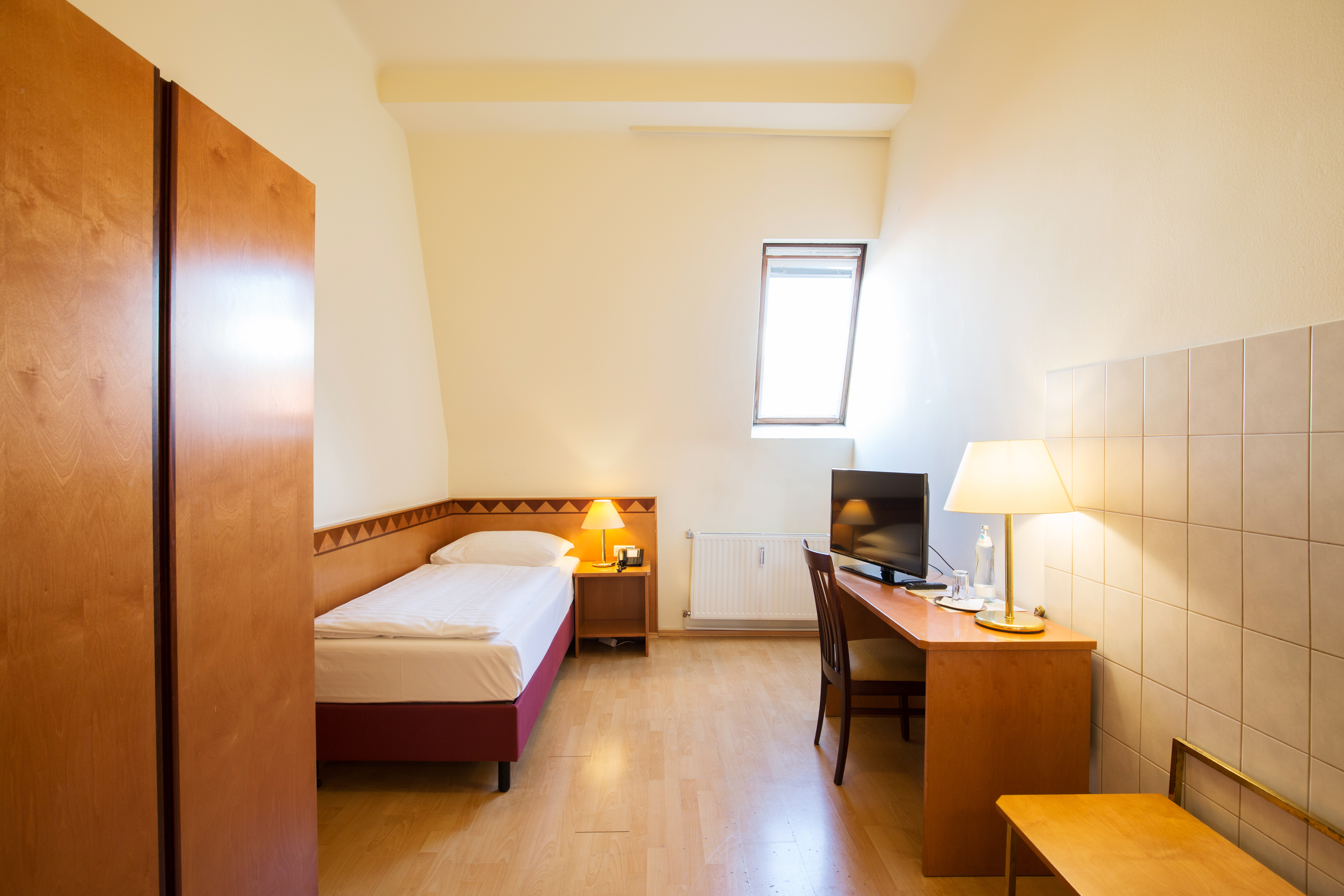 Single Economy with Shared Bathroom