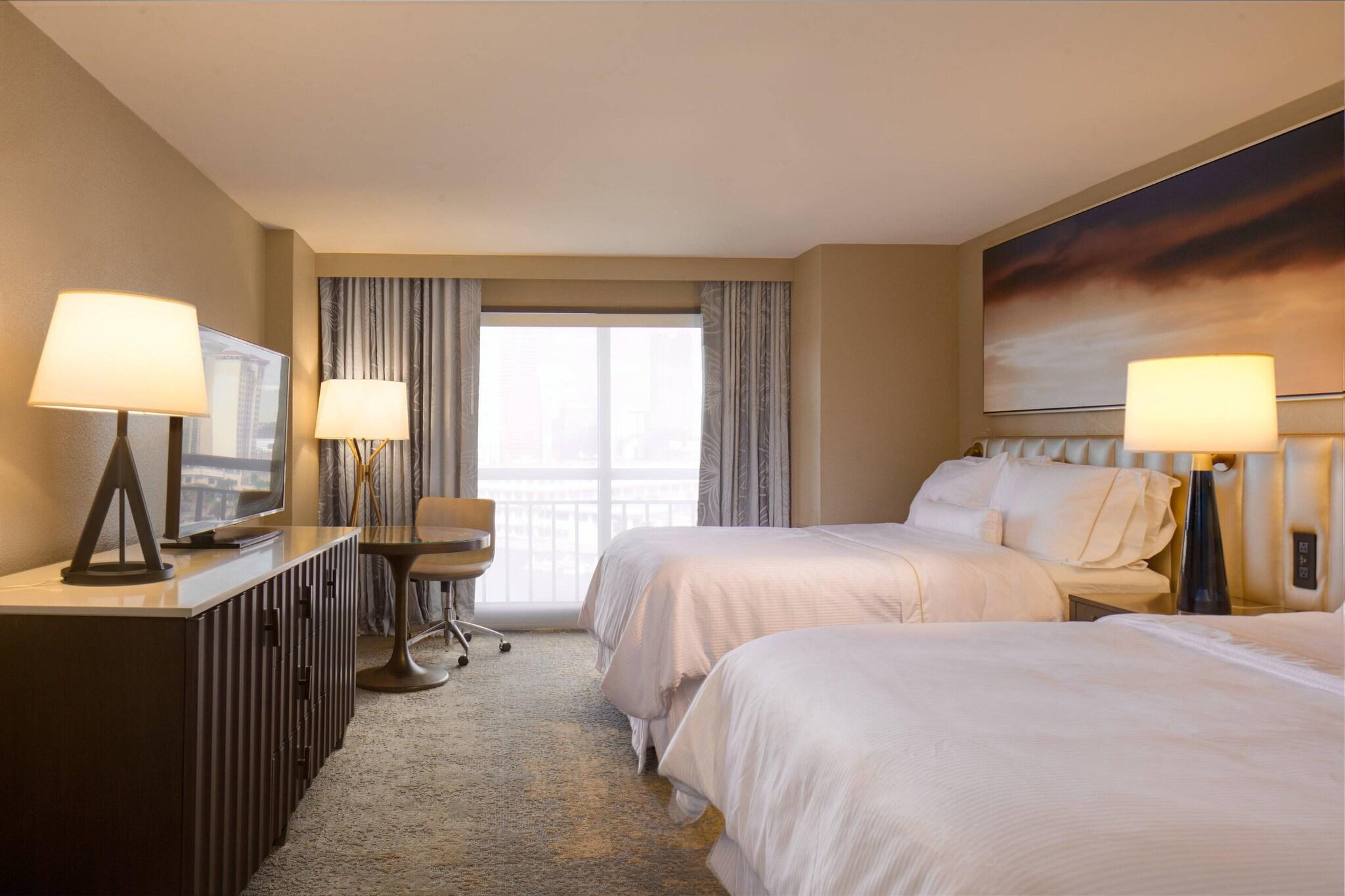 Quadruple City View Two Queen Beds