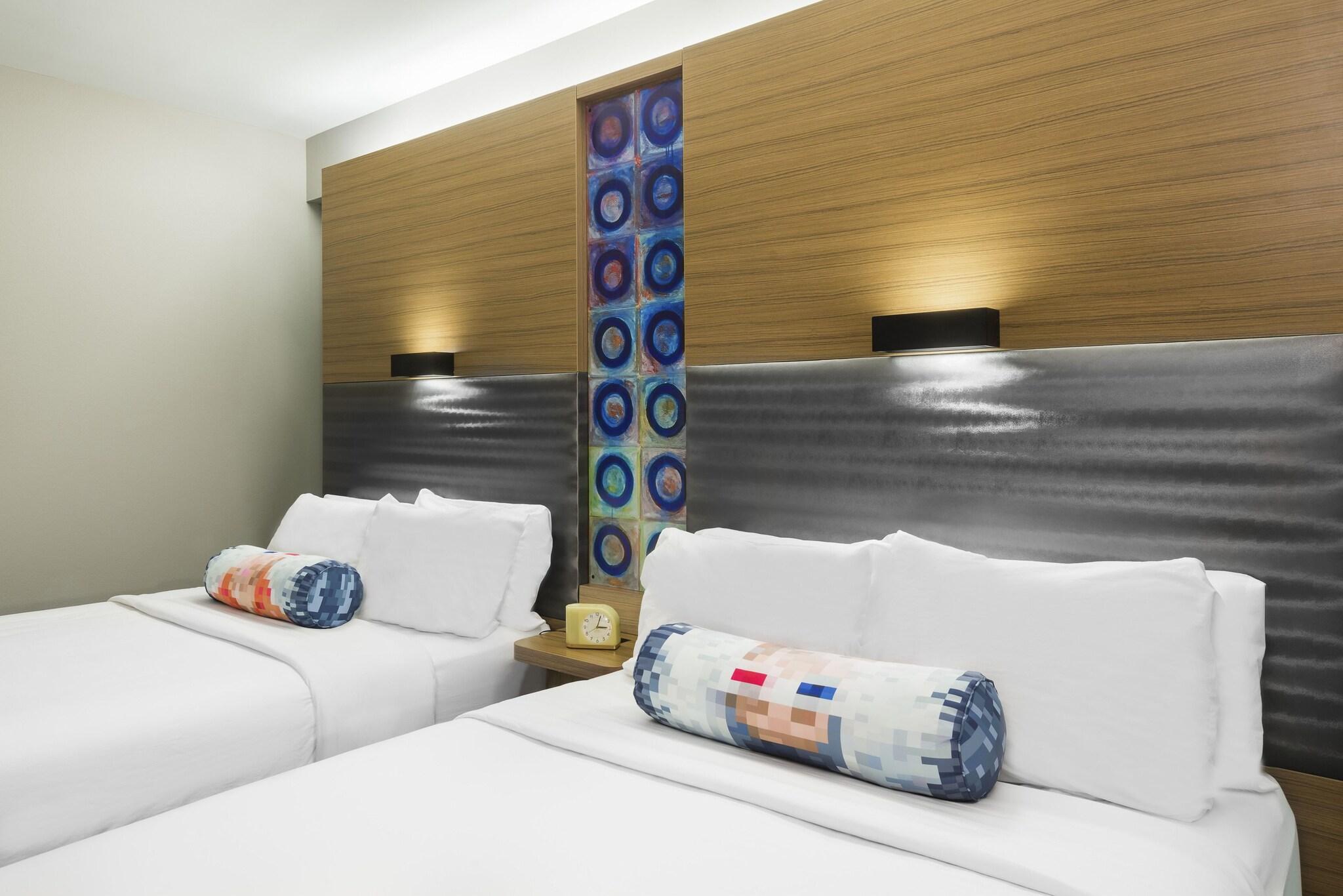 Quadruple City View Two Queen Beds