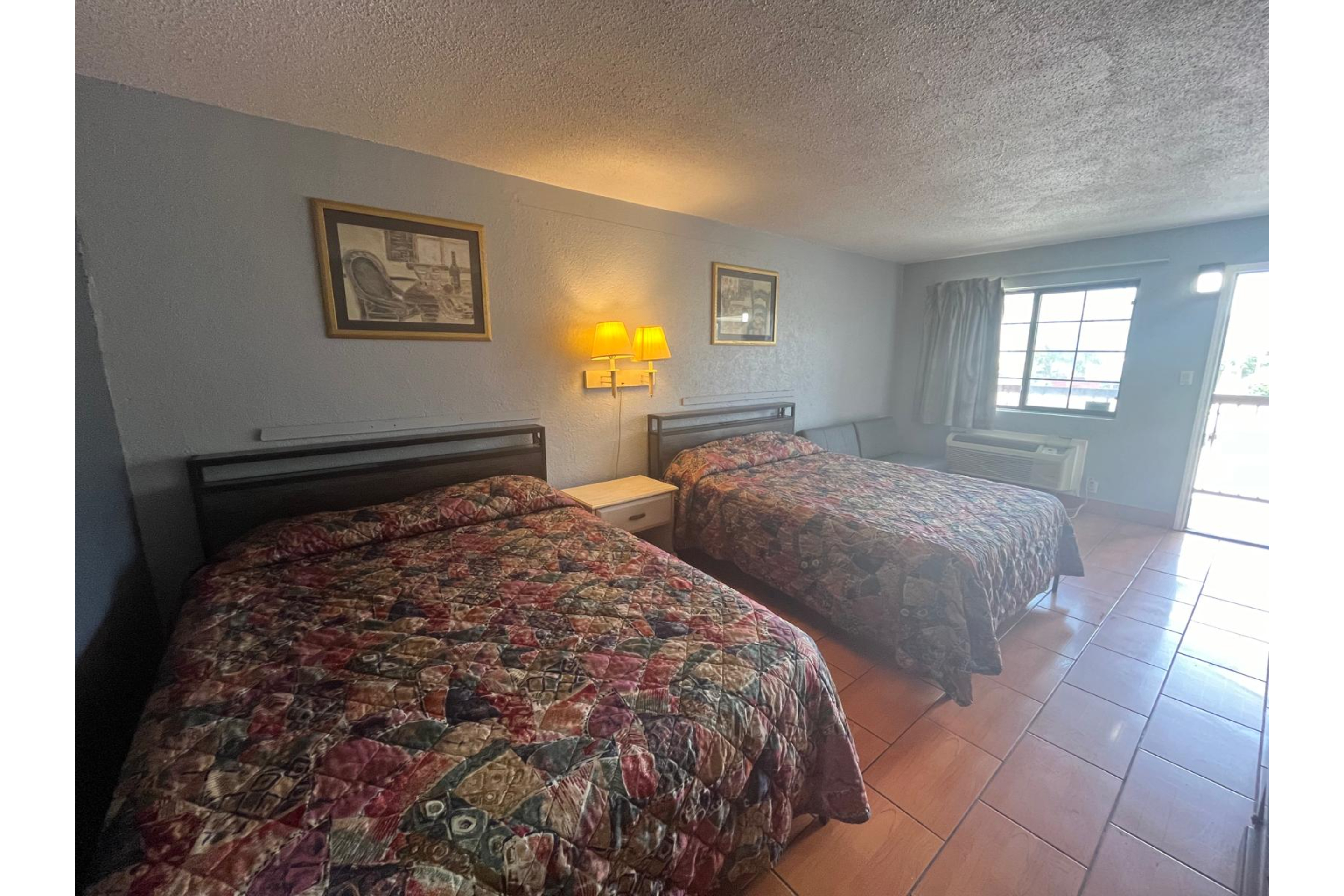 Quadruple Classic Two Queen Beds