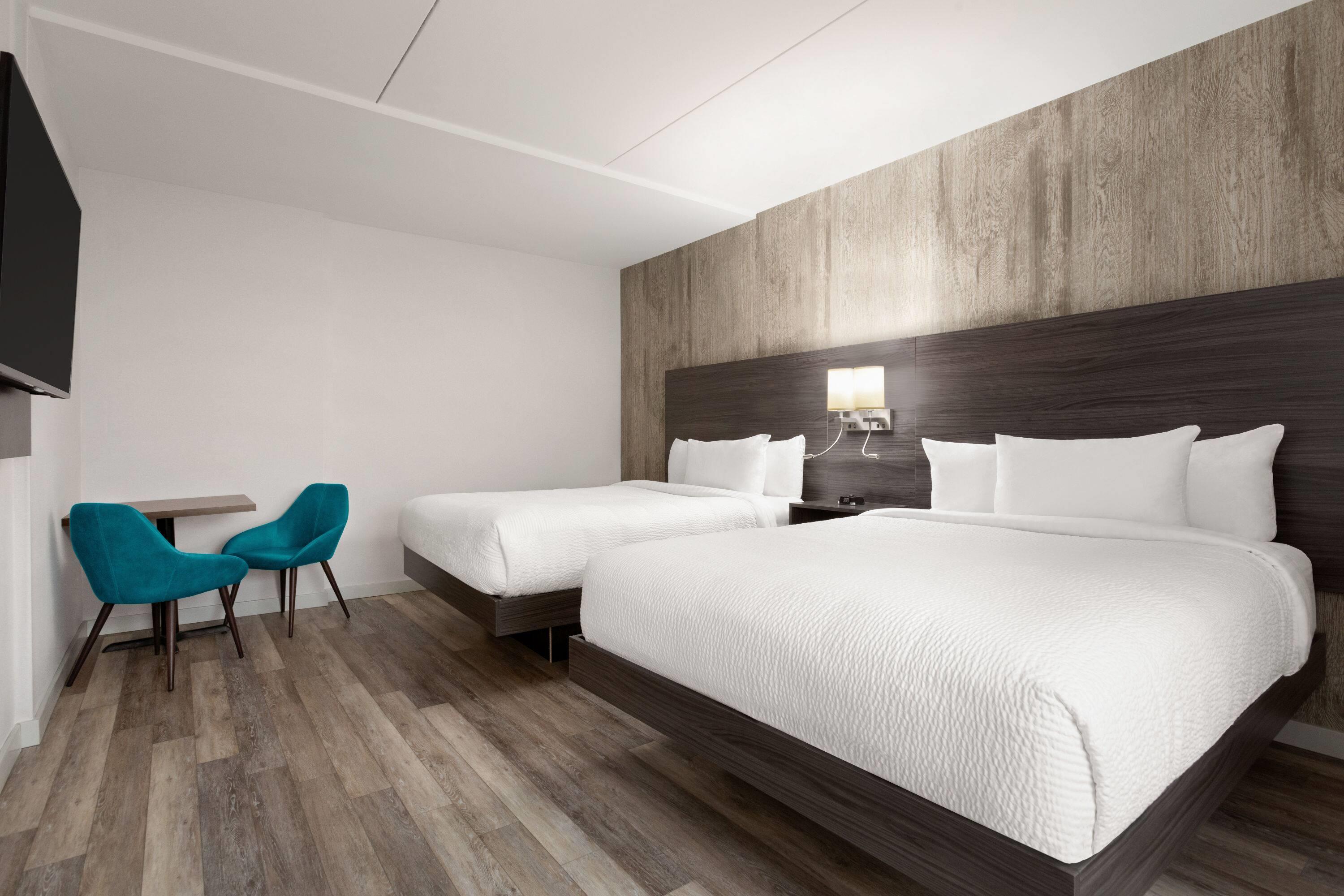 Quadruple Two Queen Beds