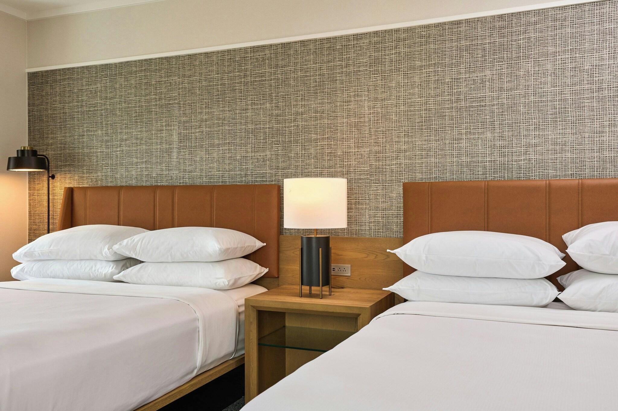 Quadruple Club Two Queen Beds