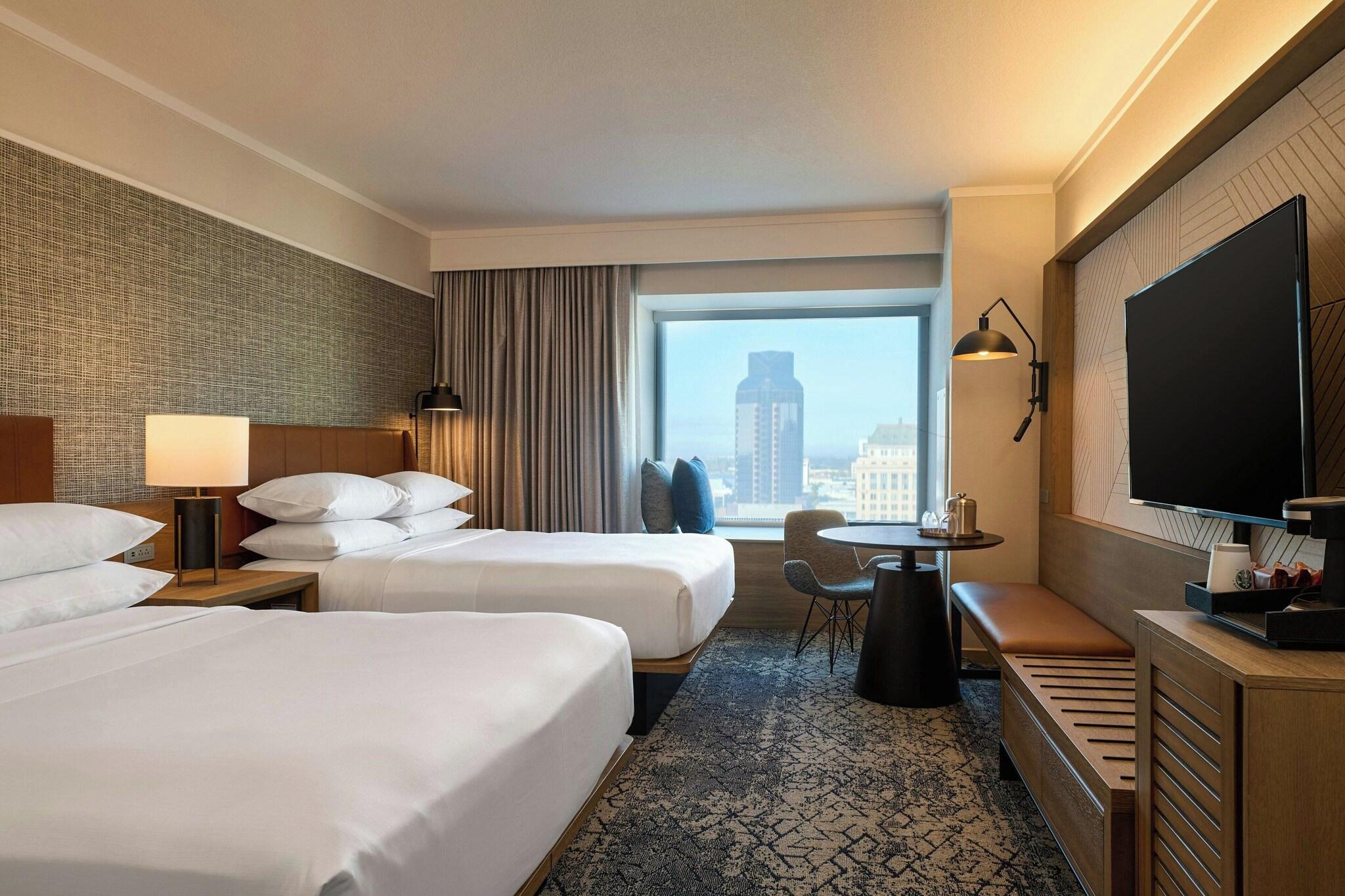 Quadruple Club Two Queen Beds