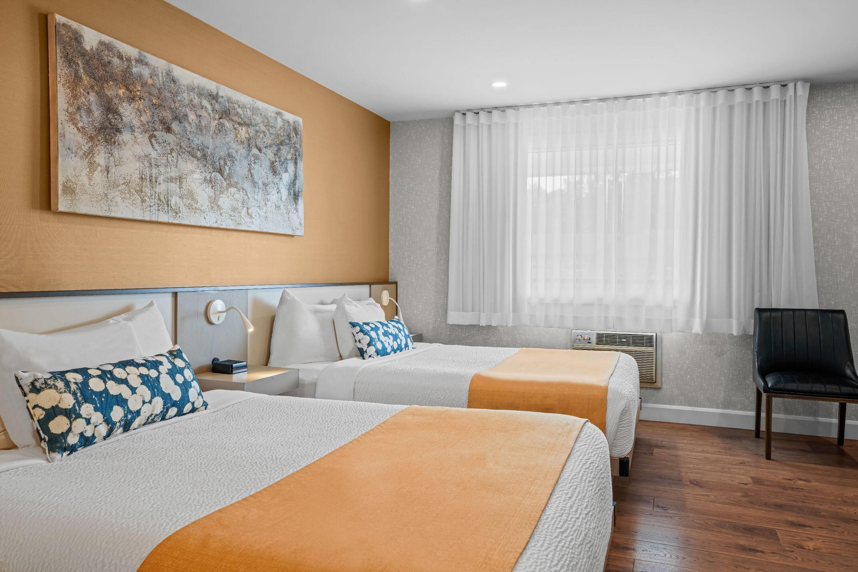 Quadruple Two Queen Beds