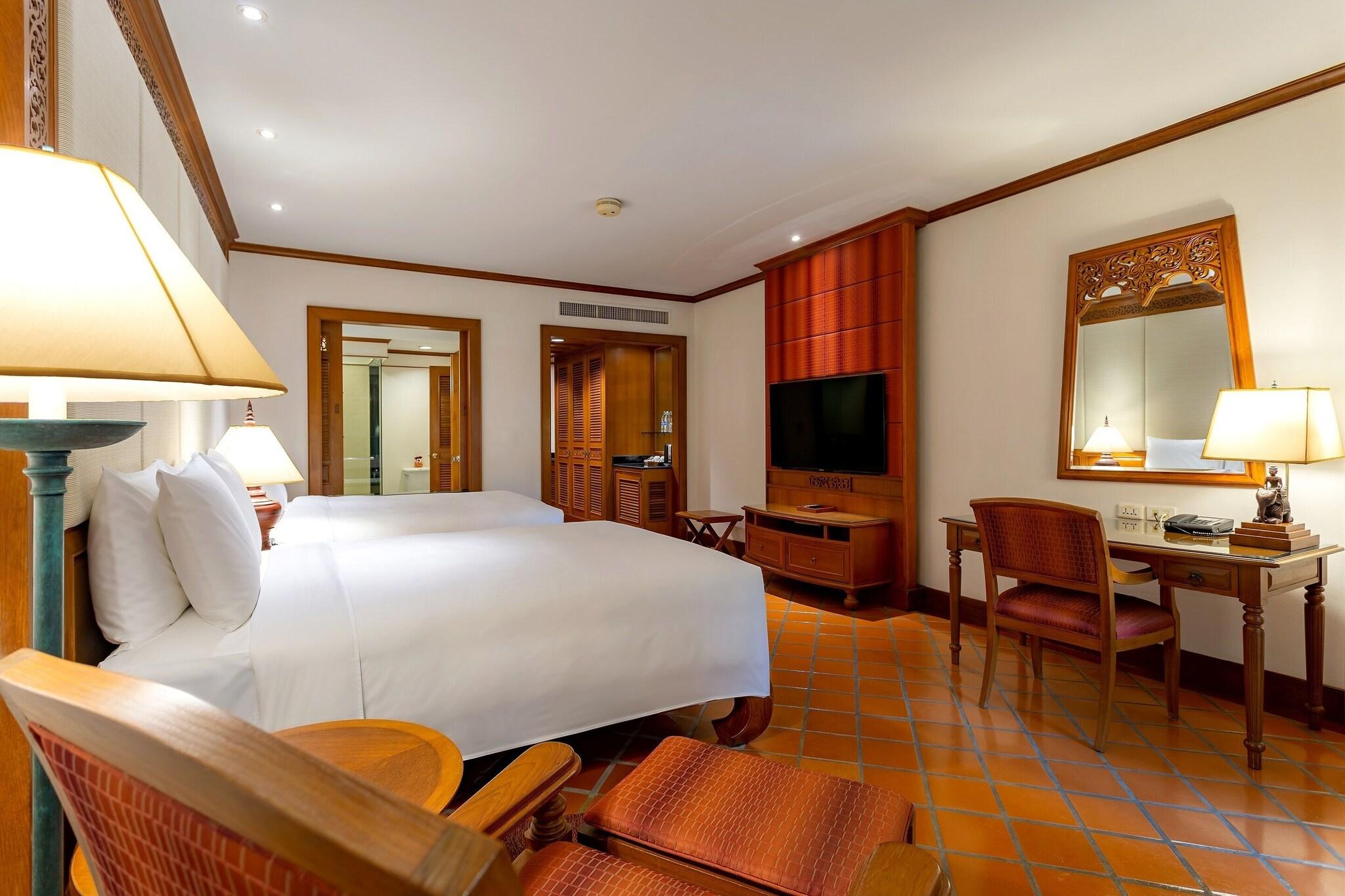 Quadruple Pool View Two Double Beds