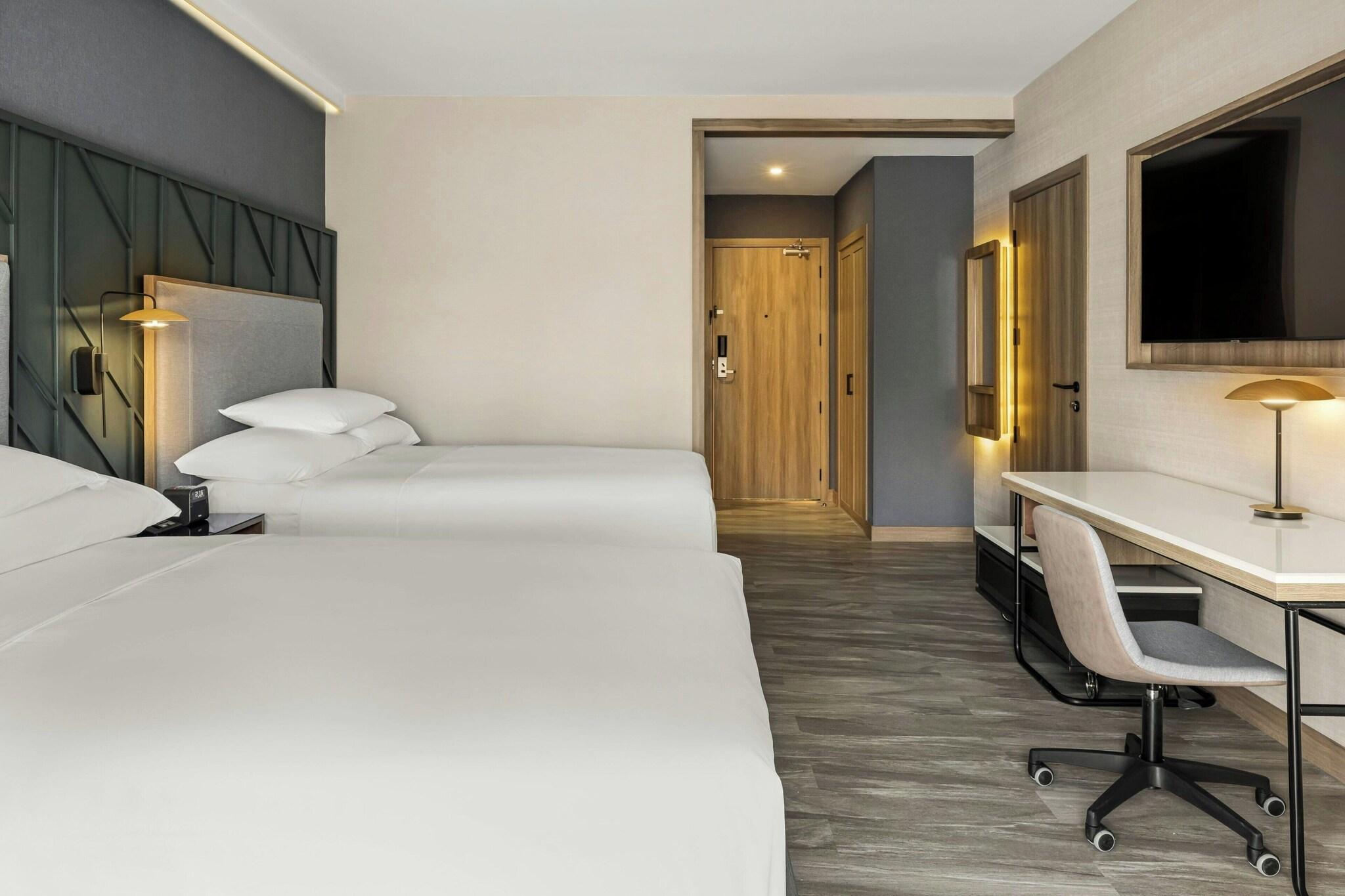 Quadruple Two Queen Beds