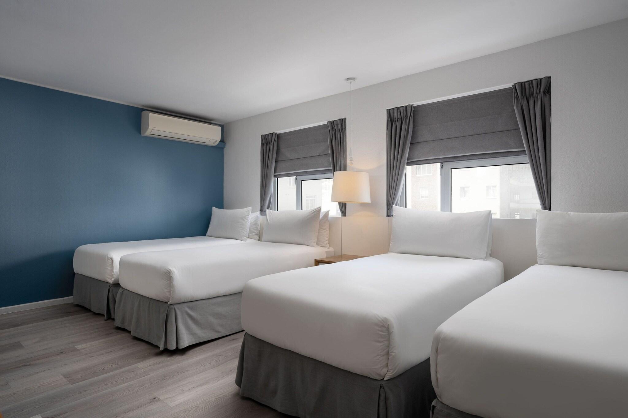 Quadruple Two King Beds
