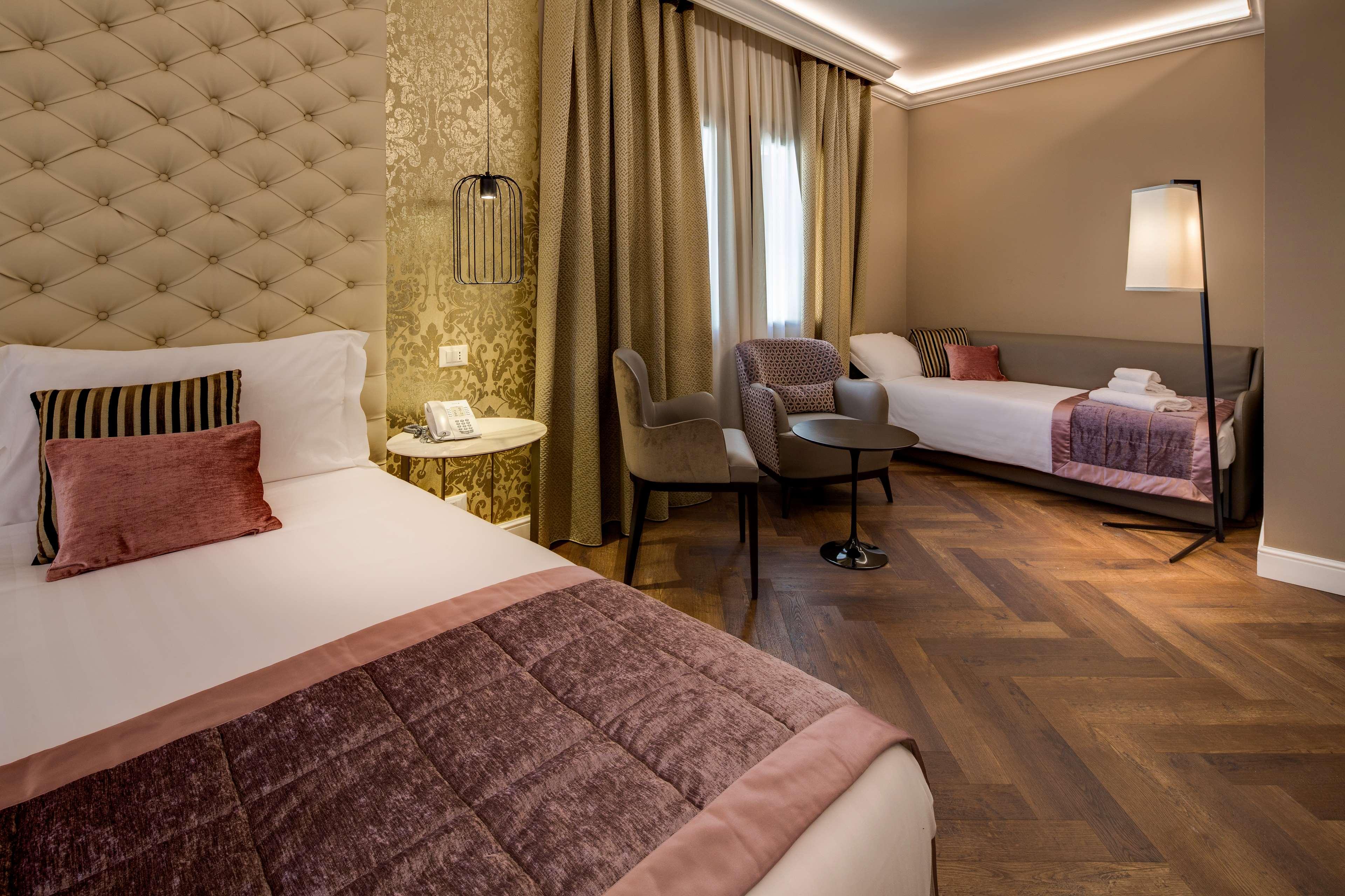 Quadruple Deluxe Queen Bed