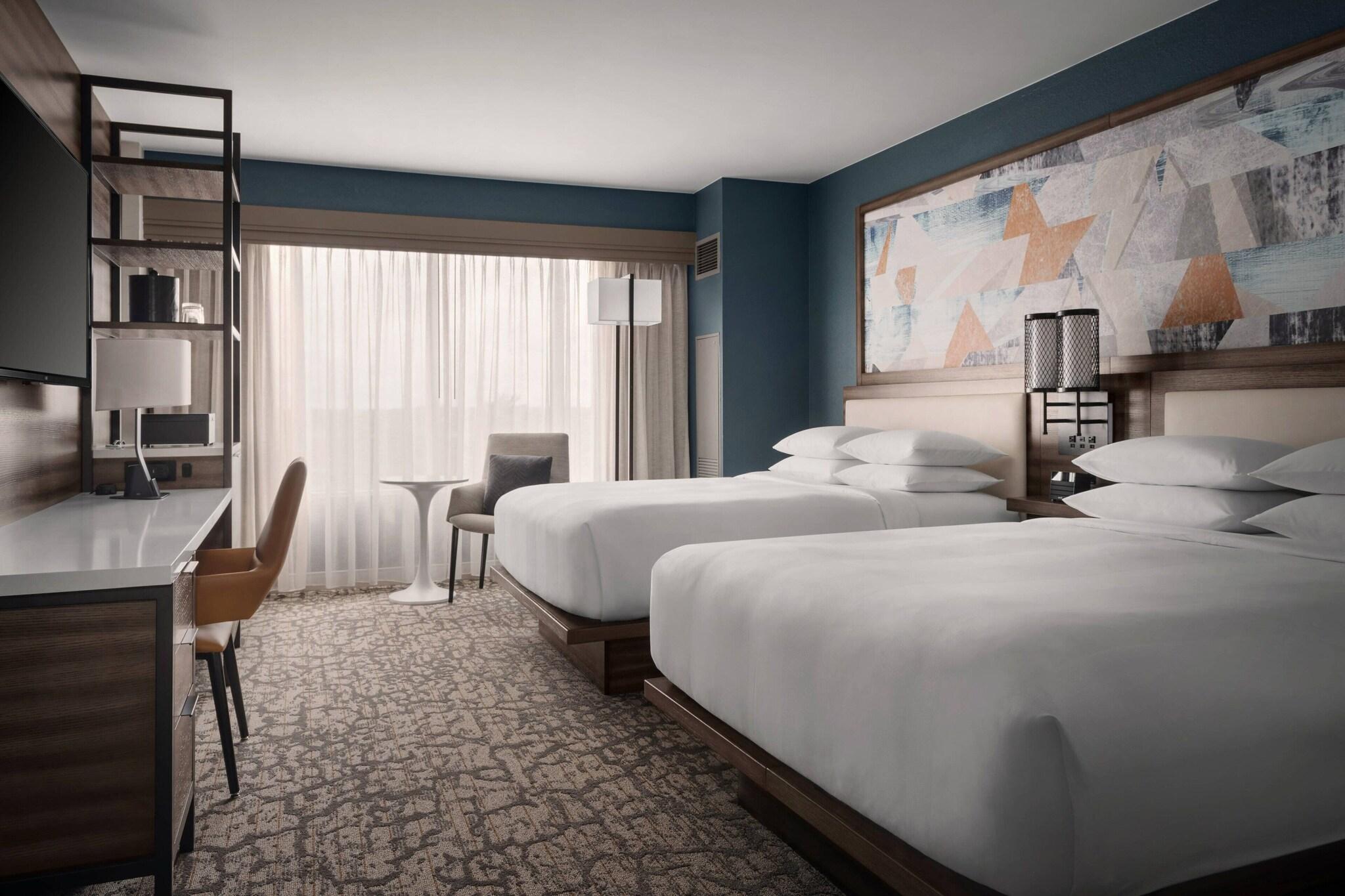 Quadruple City View Two Queen Beds