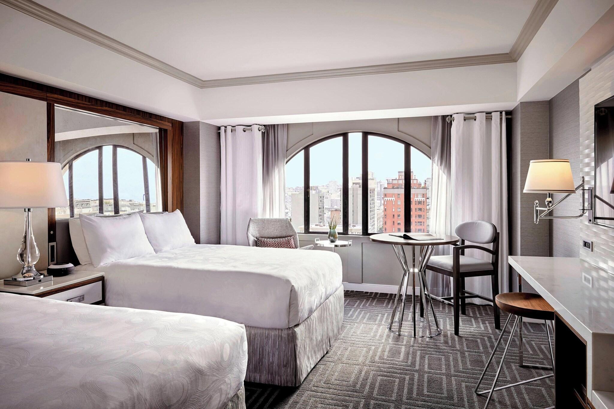 Quadruple City View Two Queen Beds