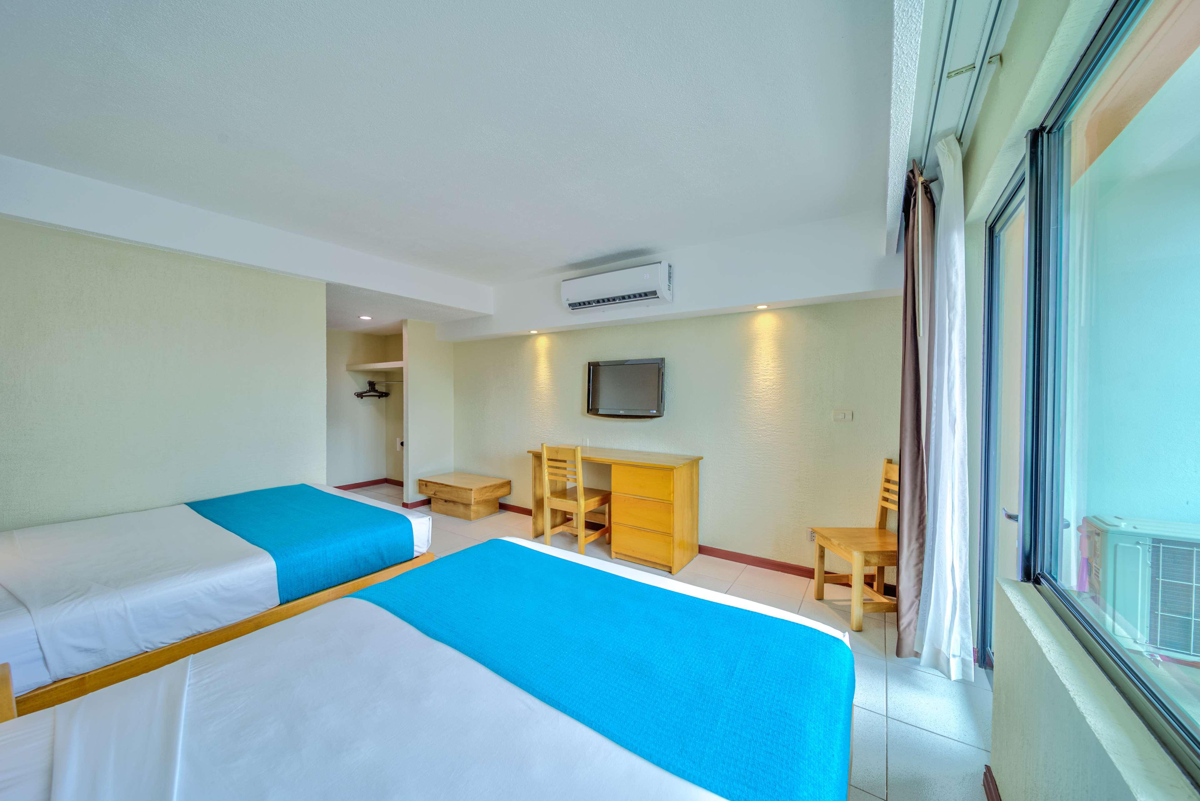 Room Pool View Two Double Beds