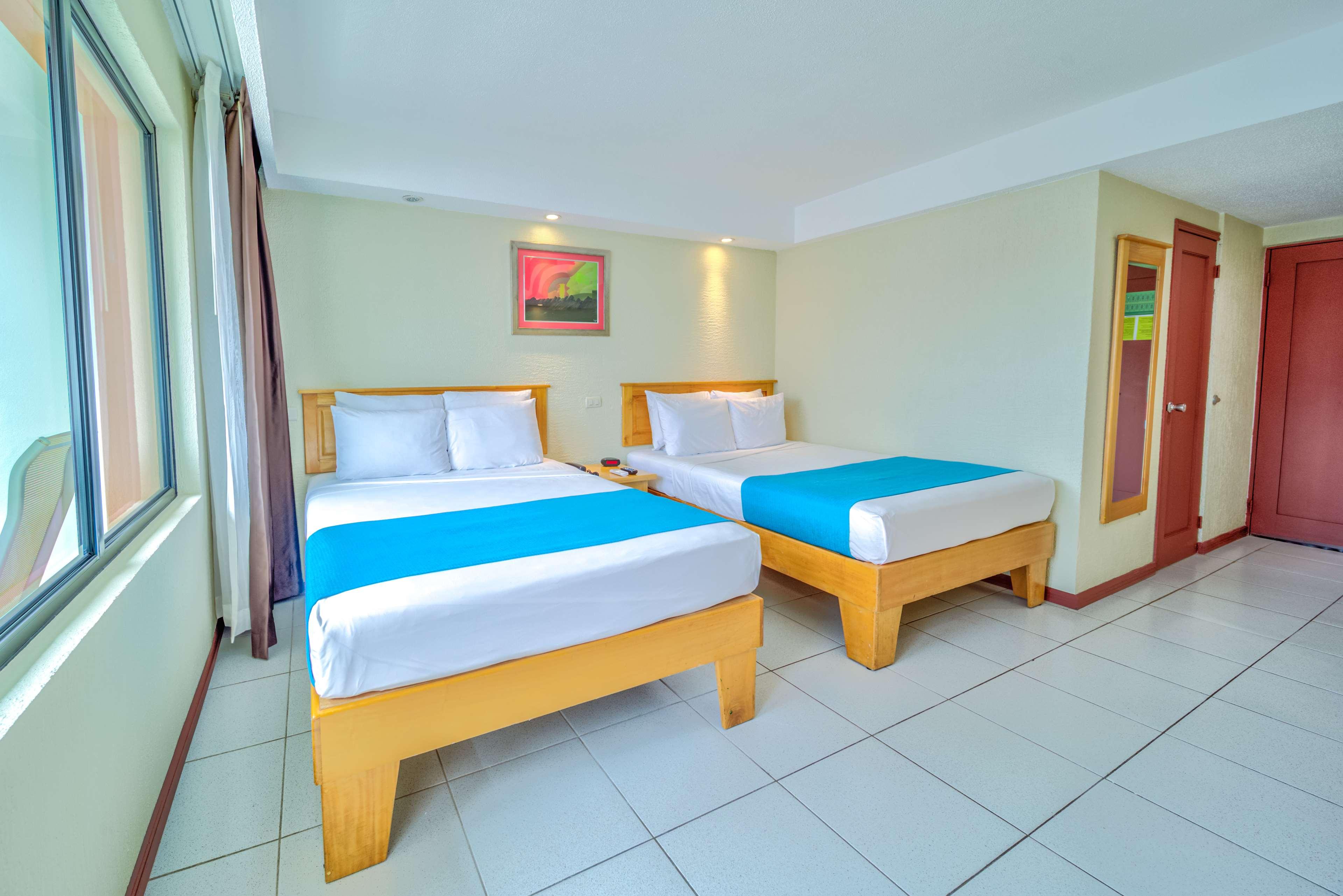 Room Pool View Two Double Beds