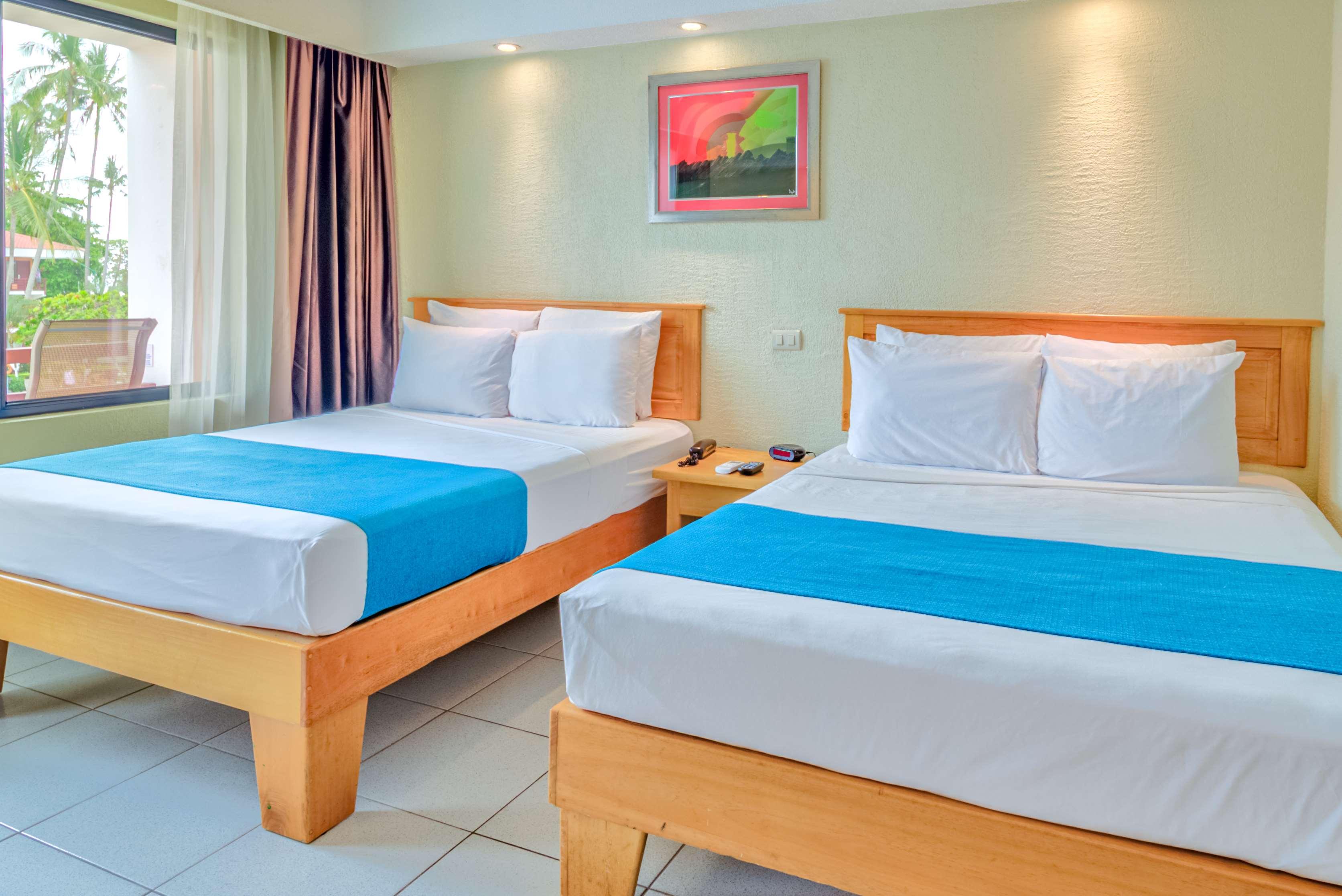 Room Pool View Two Double Beds