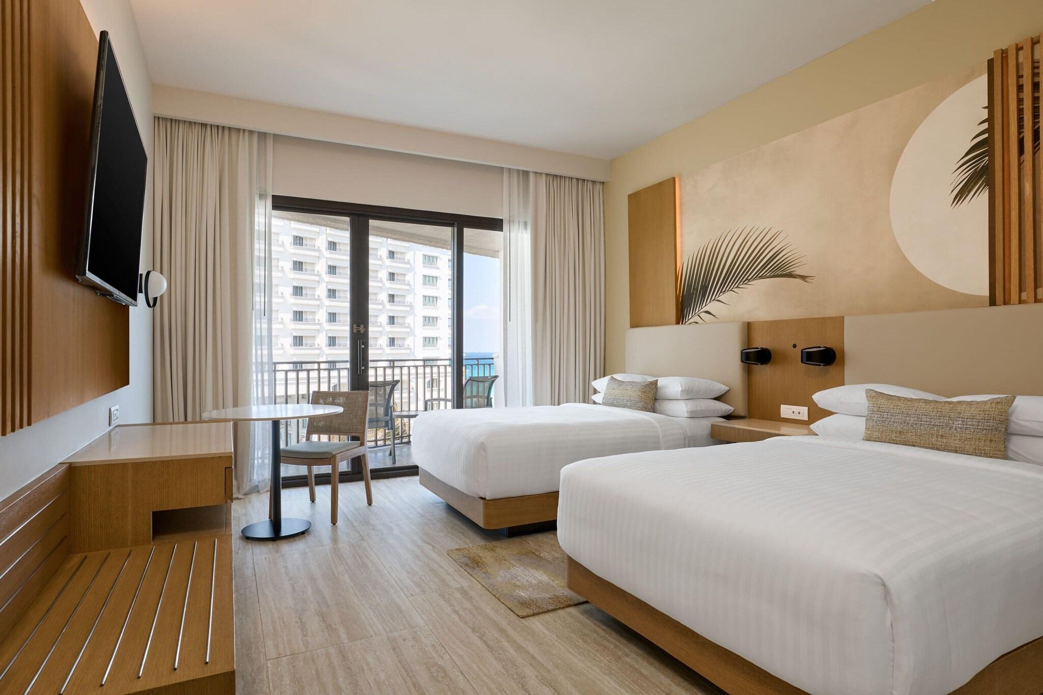 Quadruple Partial Ocean View Two Double Beds