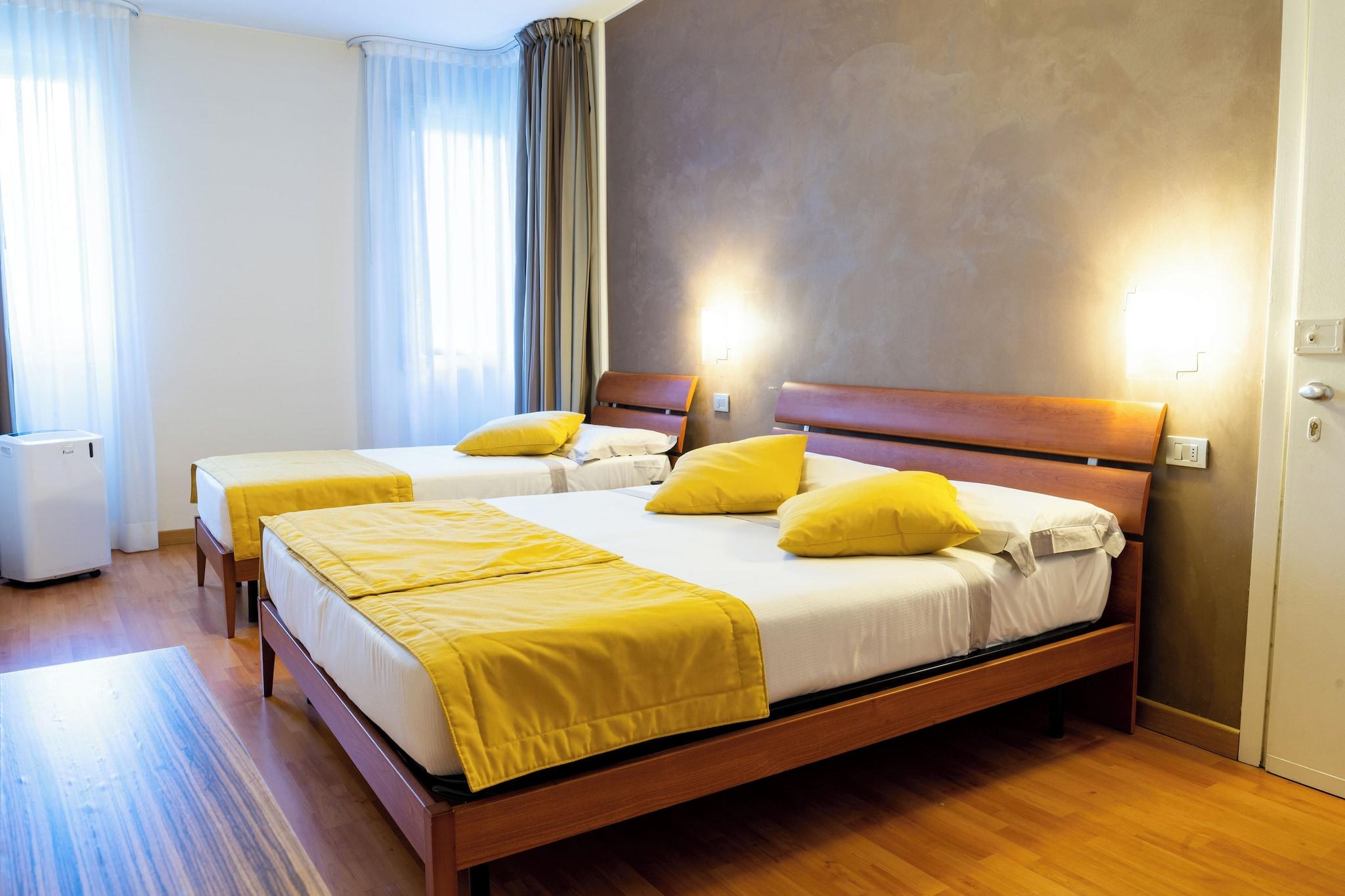 Quadruple with Double Bed