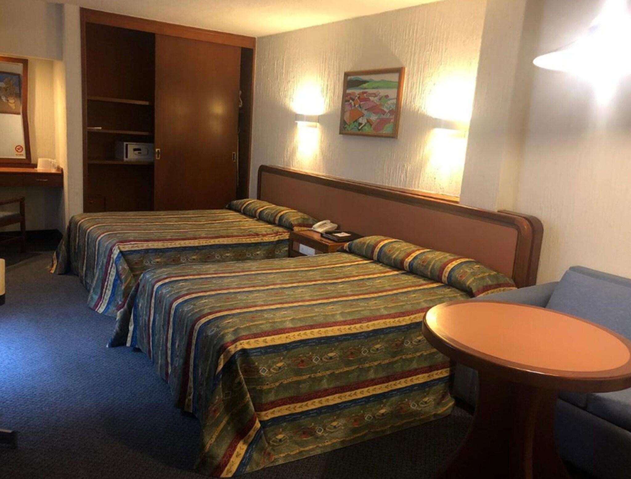 Triple Two Queen Beds