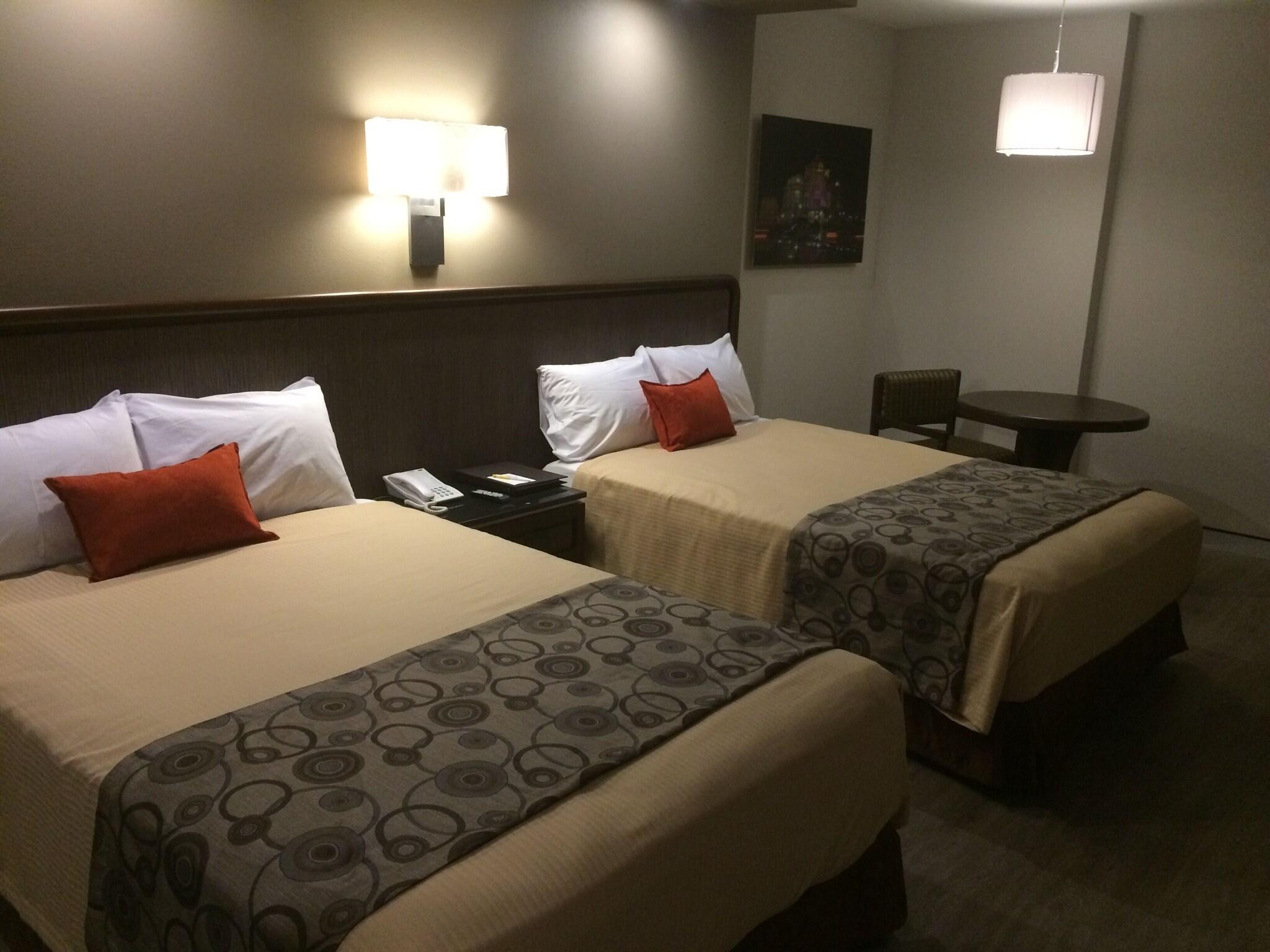 Triple Two Queen Beds